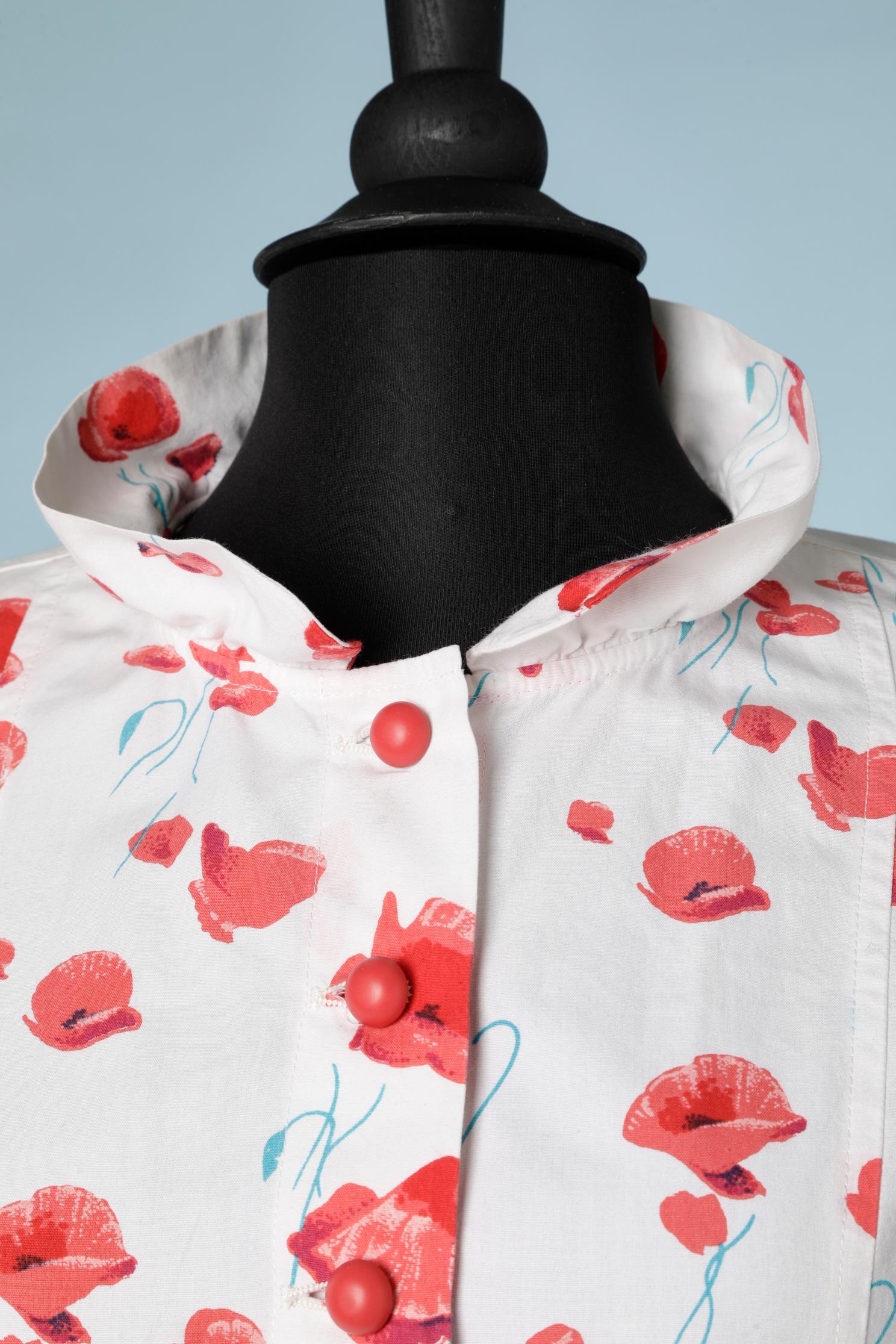 White cotton poppies printed shirt and skirt ensemble. Ruffles around the neck 
SIZE 40 (S) 