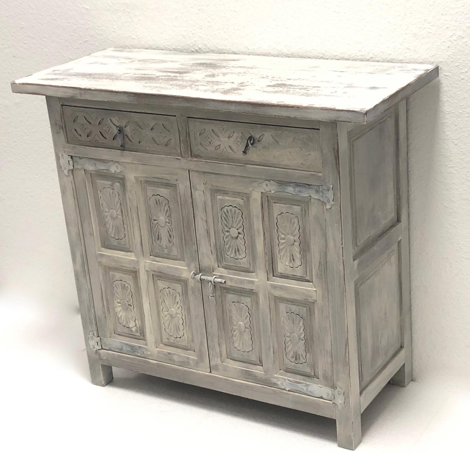This is a beautiful credenza cabinet sideboard, circa 1960 in date and painted by an artist in white to look like the highly modern shabby chic style.
A nice addition to year entry hall or for your Swedish Farmhouse style home. Add an elegant touch
