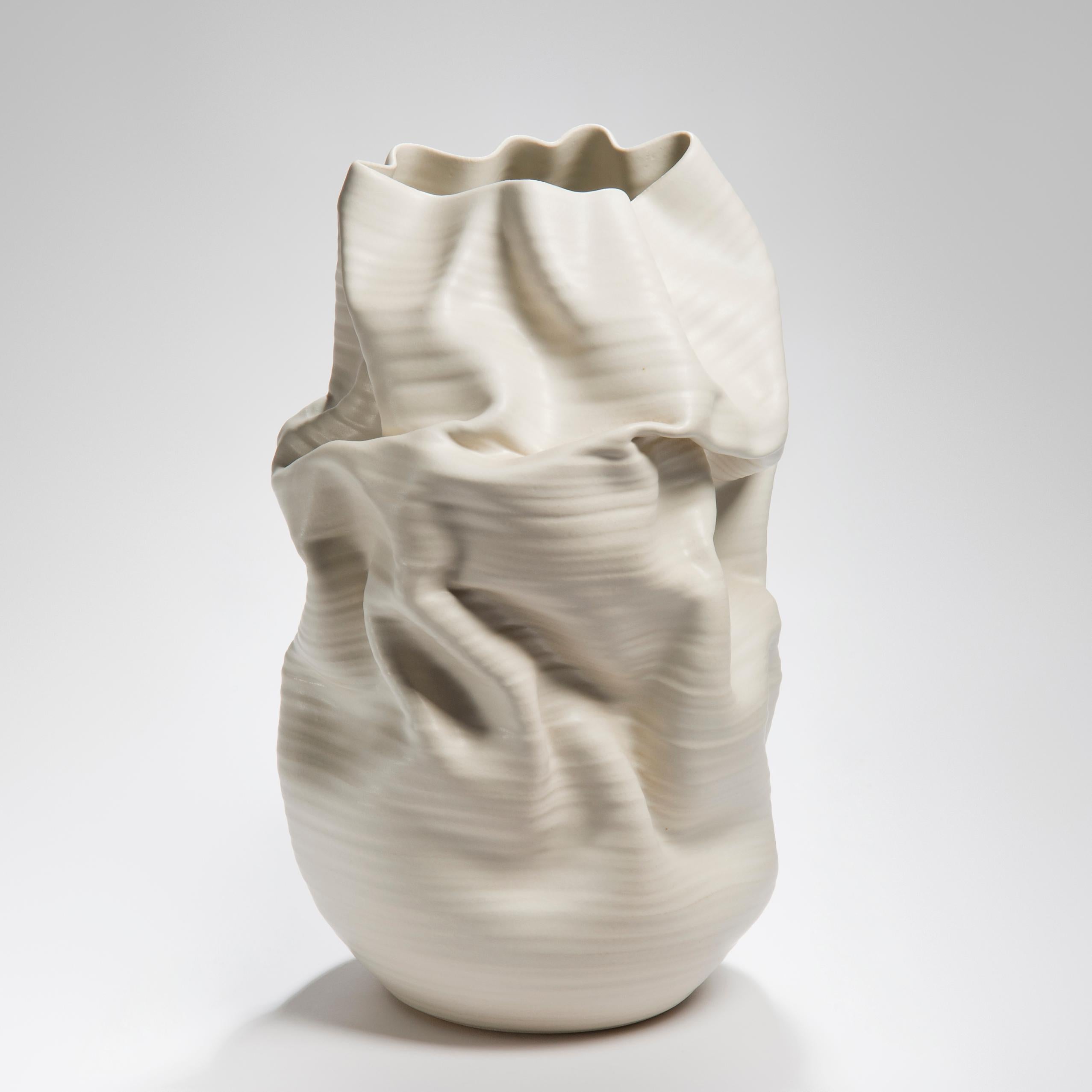 White Crumpled Form No 37 is a unique ceramic sculptural vessel by the British artist Nicholas Arroyave-Portela.

Nicholas Arroyave-Portela’s professional ceramic practice began in 1994. After 20 years based in London, he moved and set up his