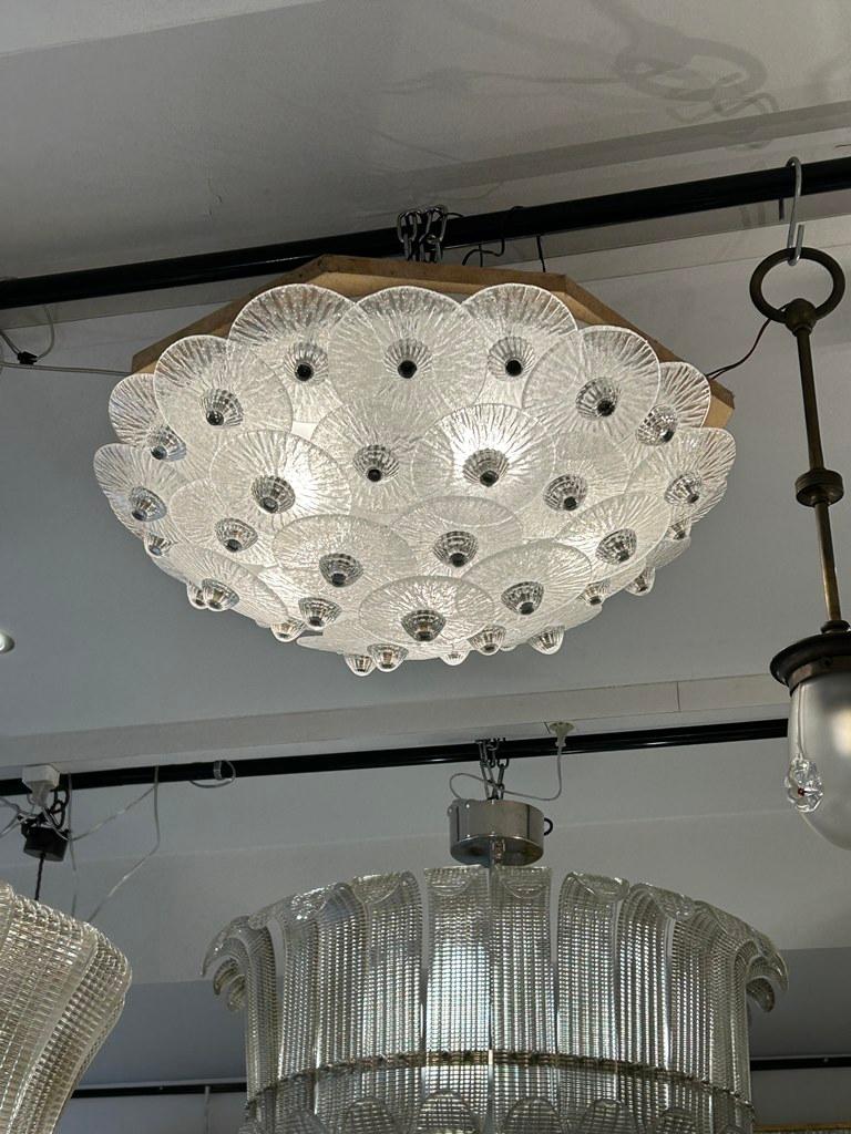 White crystal ceiling light
Diameter 68 x Height 20 cm
5 bulbs