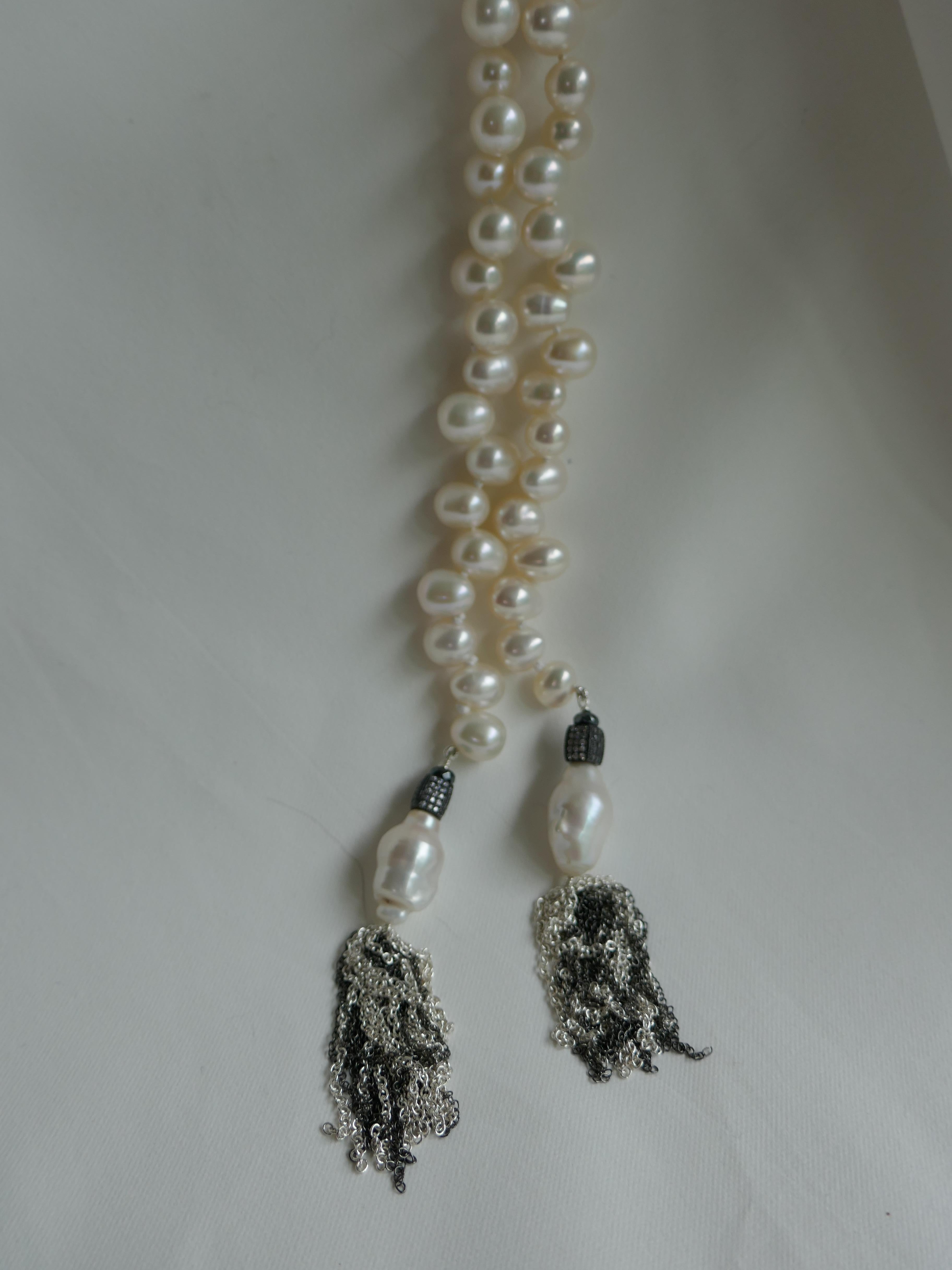 This is a very versatile necklace.Lariats are great , as they may be worn different ways, as well as layered with other necklaces in your collection. The pearls on this lariat are a nice size and have little blemishes and great luster. These pearls