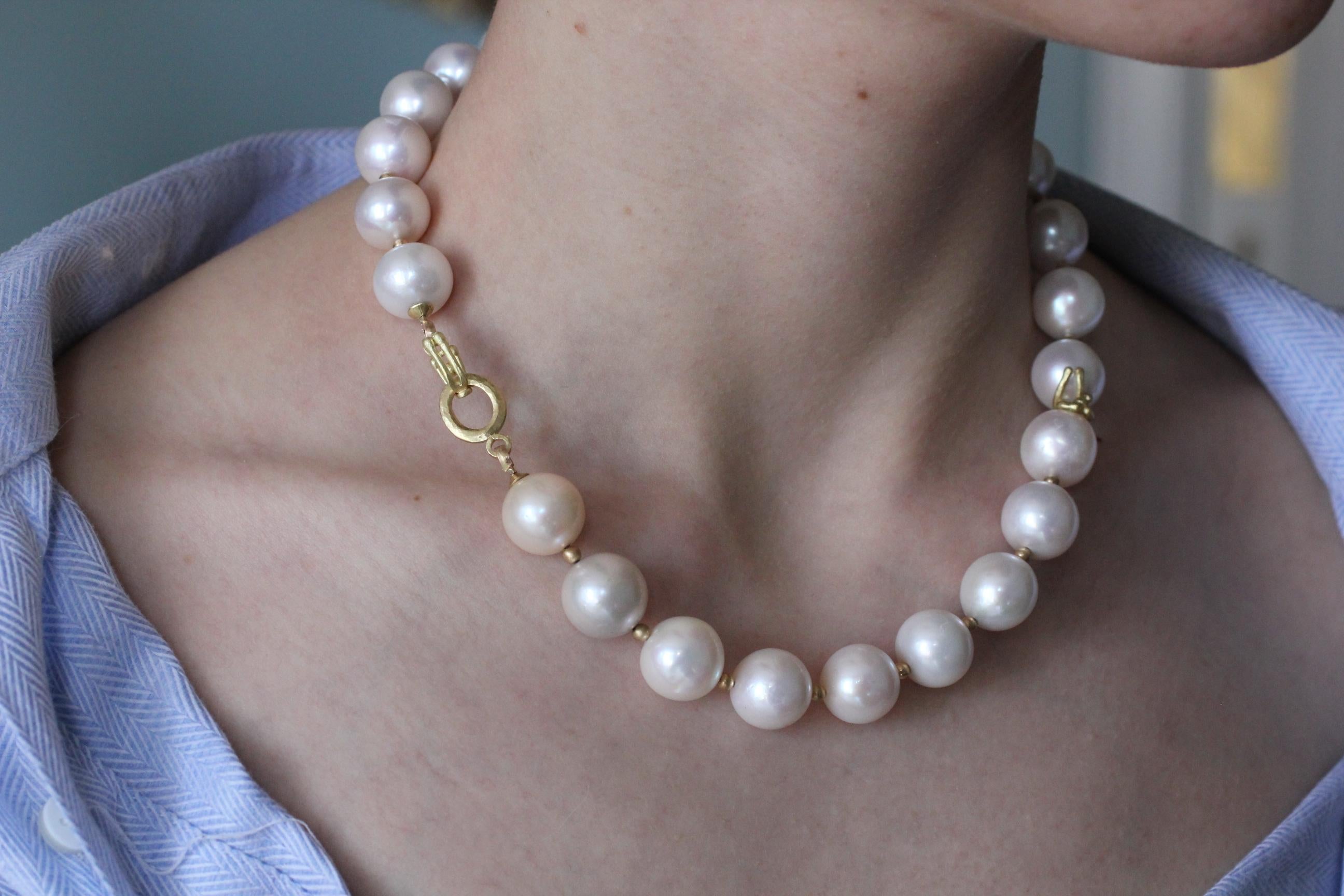 The Light. This white large cultured pearl beaded handmade choker necklace is elegant in its clean beautiful versatility. Great as a gift for a Bride, a Wedding, Christmas or any other holiday occasion. Beautiful lustrous white mostly round pearls