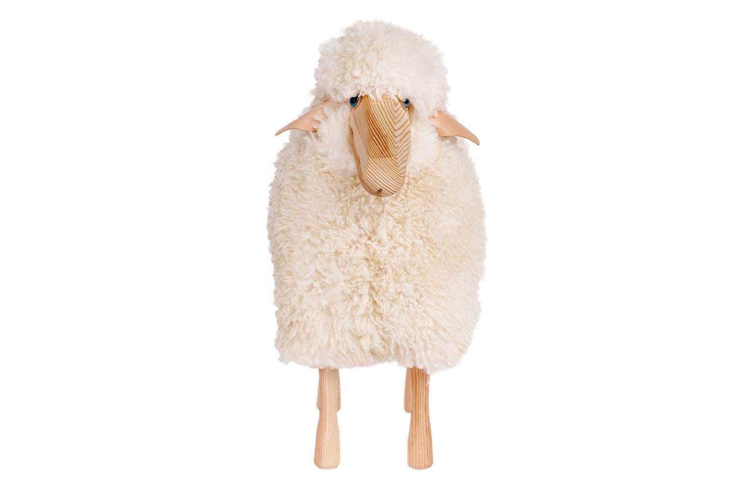 White wool small sheep

This small sheep with real sheepskin on natural pine wood and natural leather ears is suitable as original seating, ottoman or for decoration. Use as a stool for example, around a dining table the back of the sheep is extra