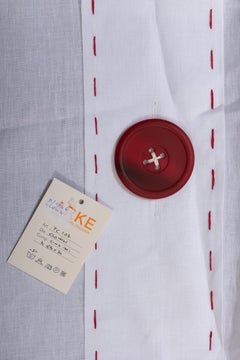 White Curtain with Large Red Buttons