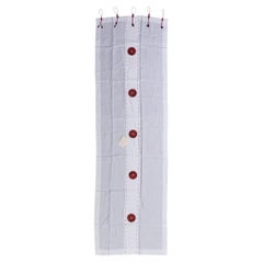 White Curtain with Large Red Buttons
