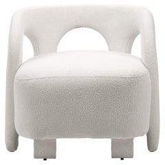 White Curvy Upholstered Armchair Inspired By Egypt's Nubian Architecture