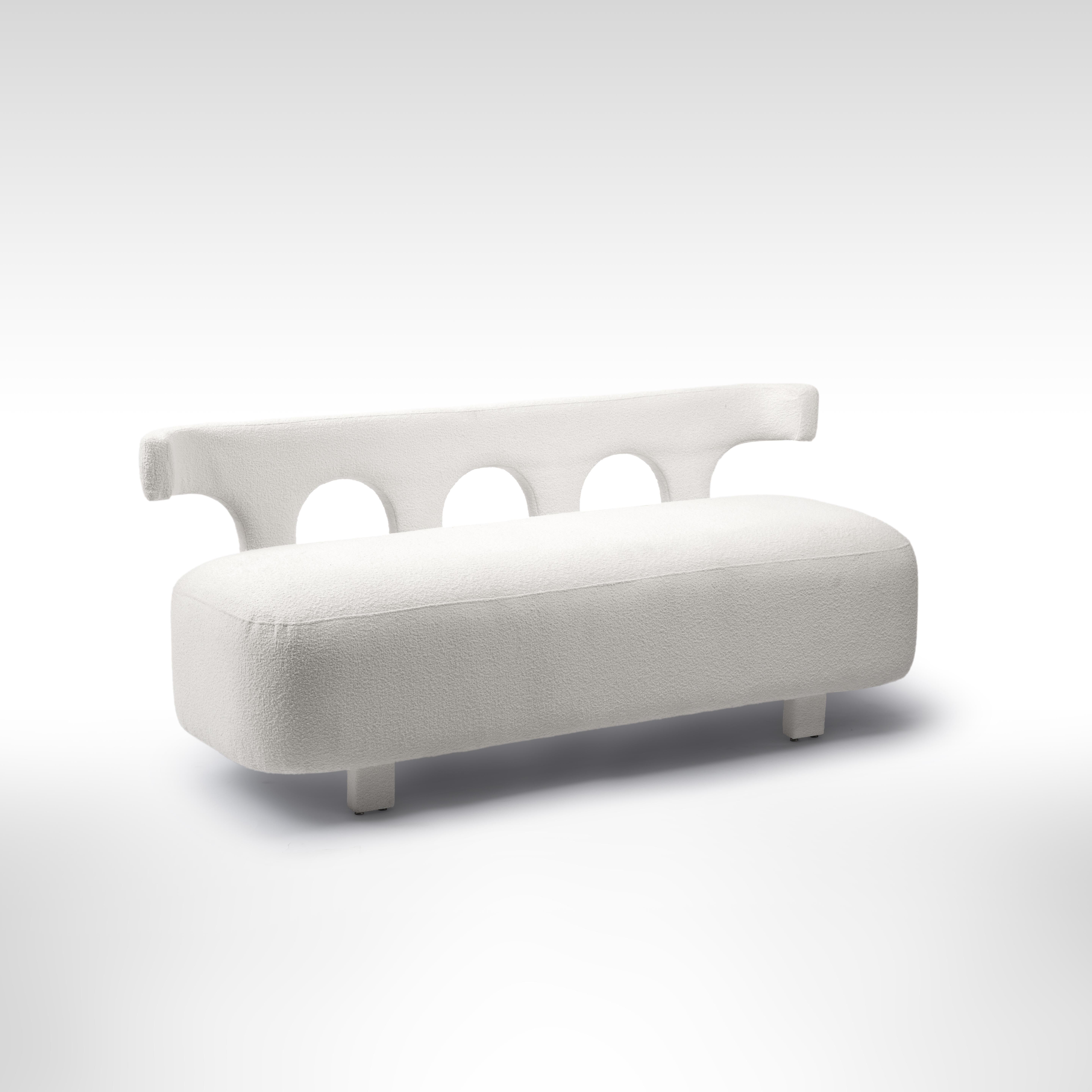White curvy upholstered sofa inspired by Egypt's Nubian Architecture

The Nubia set is the heart of this Nubian collection. Nubian houses are typically built for entire families and are known for having an outdoor central courtyard where the