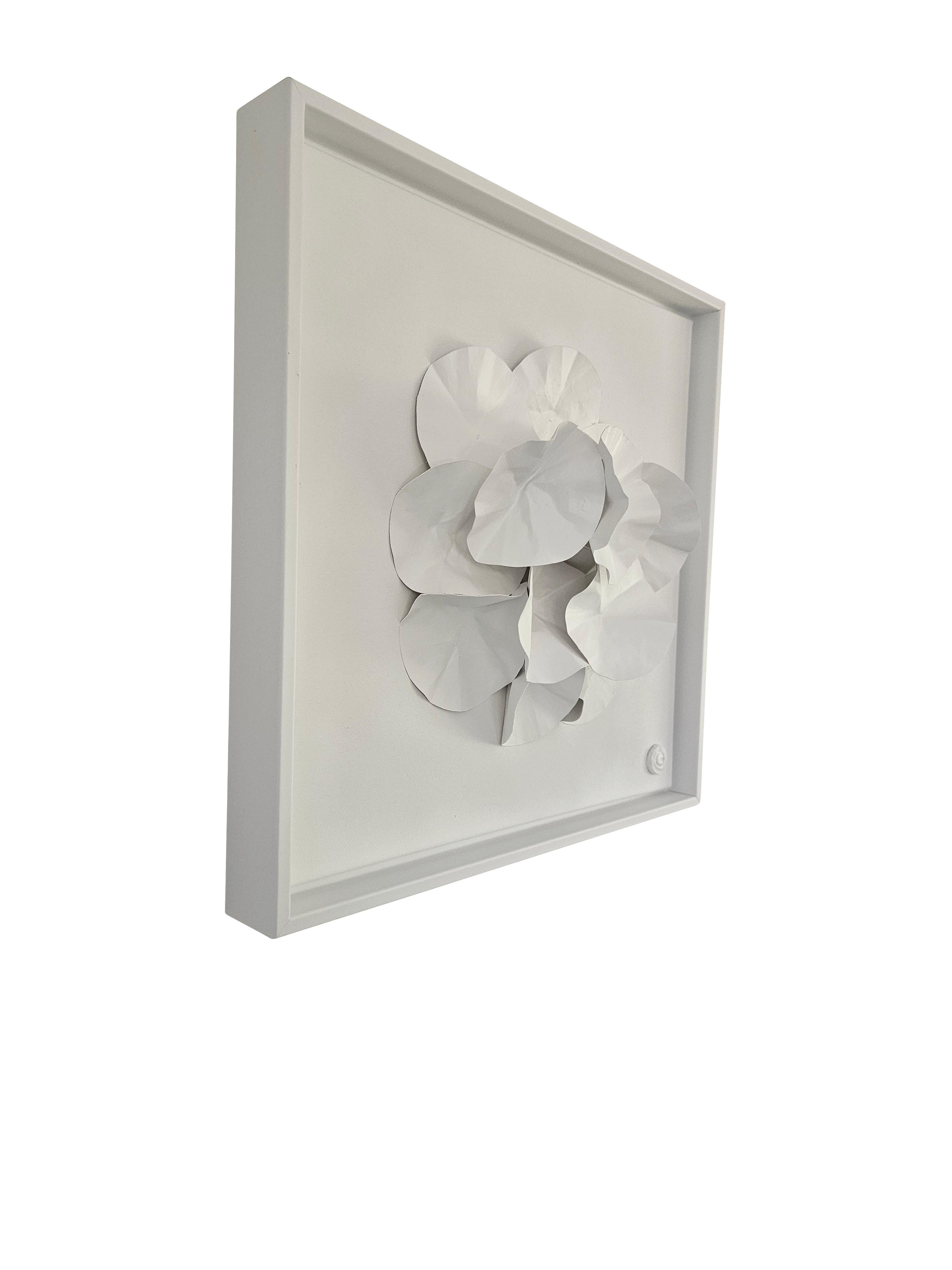 Contemporary French artist Veronique Guillou framed hand cut paper sculpture.
Paper is cut, painted and sprayed to remain in abstract three dimensional shape.
White wood frame.

