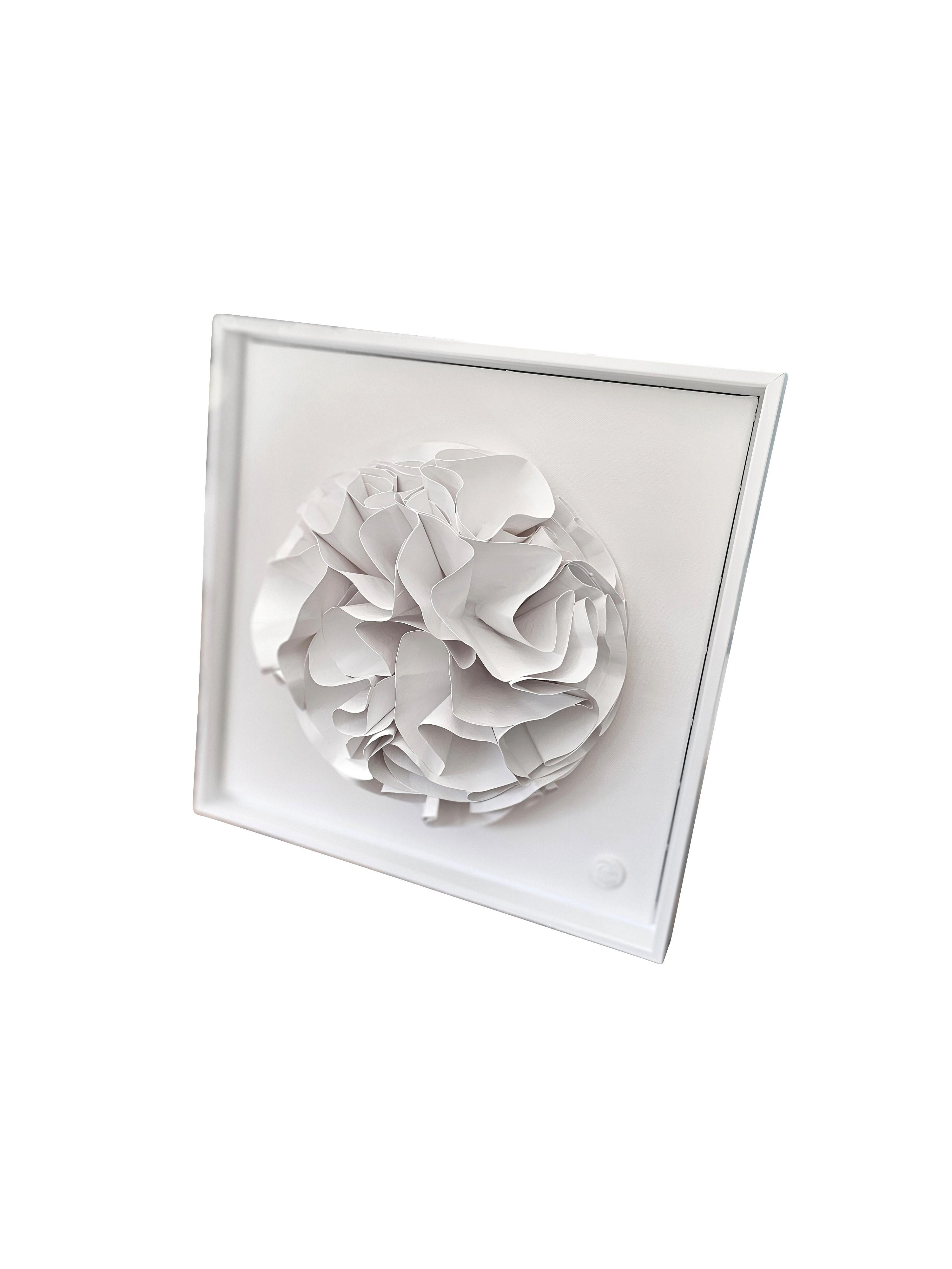 Contemporary French artist Veronique Guillou framed hand cut paper sculpture.
Paper is cut, painted and sprayed to remain in a three dimensional abstract shape.
White wood frame.
