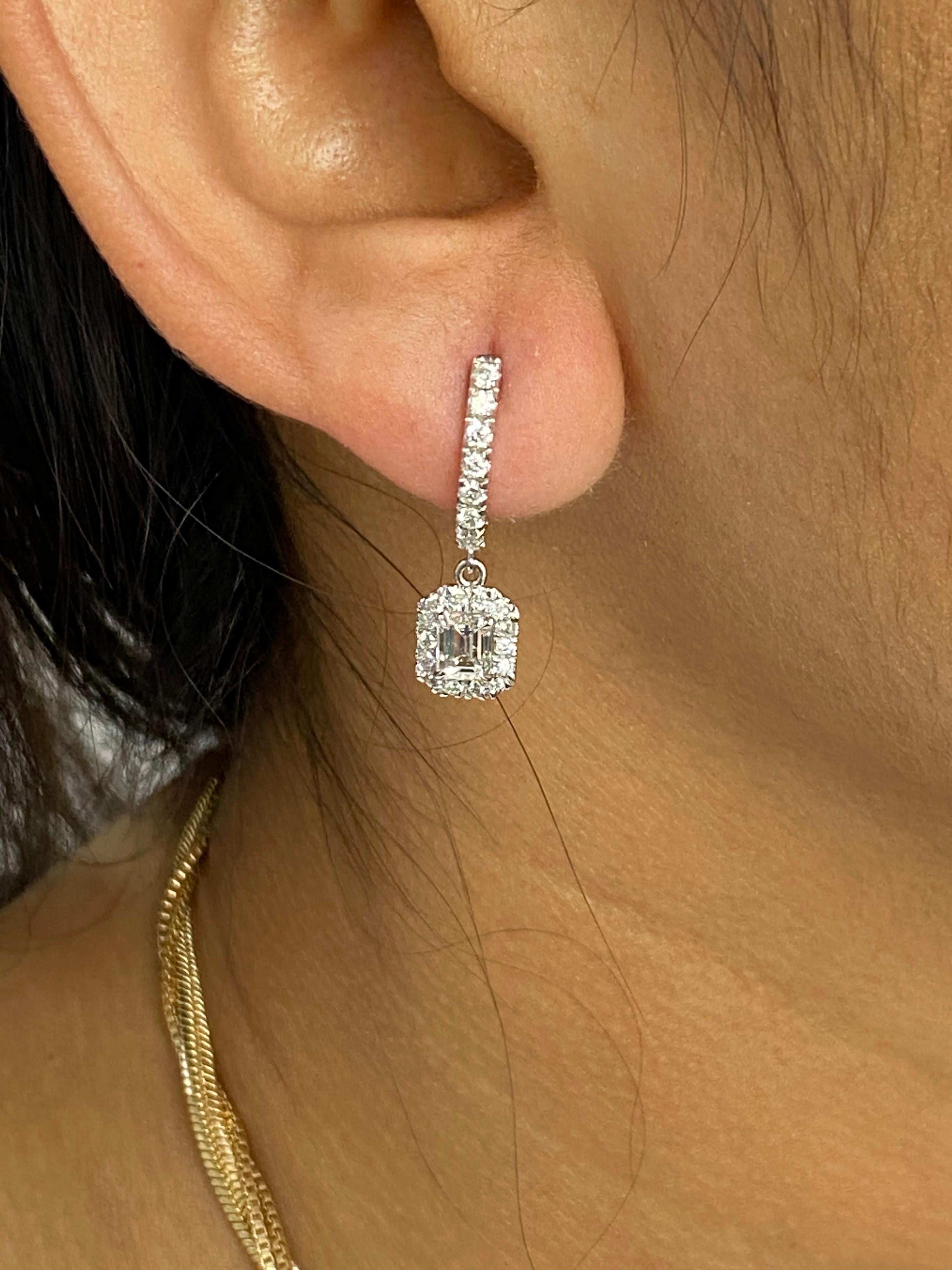 Women's Emerald Diamond Dangling Drop Earrings in 14 Karat White Gold For Sale