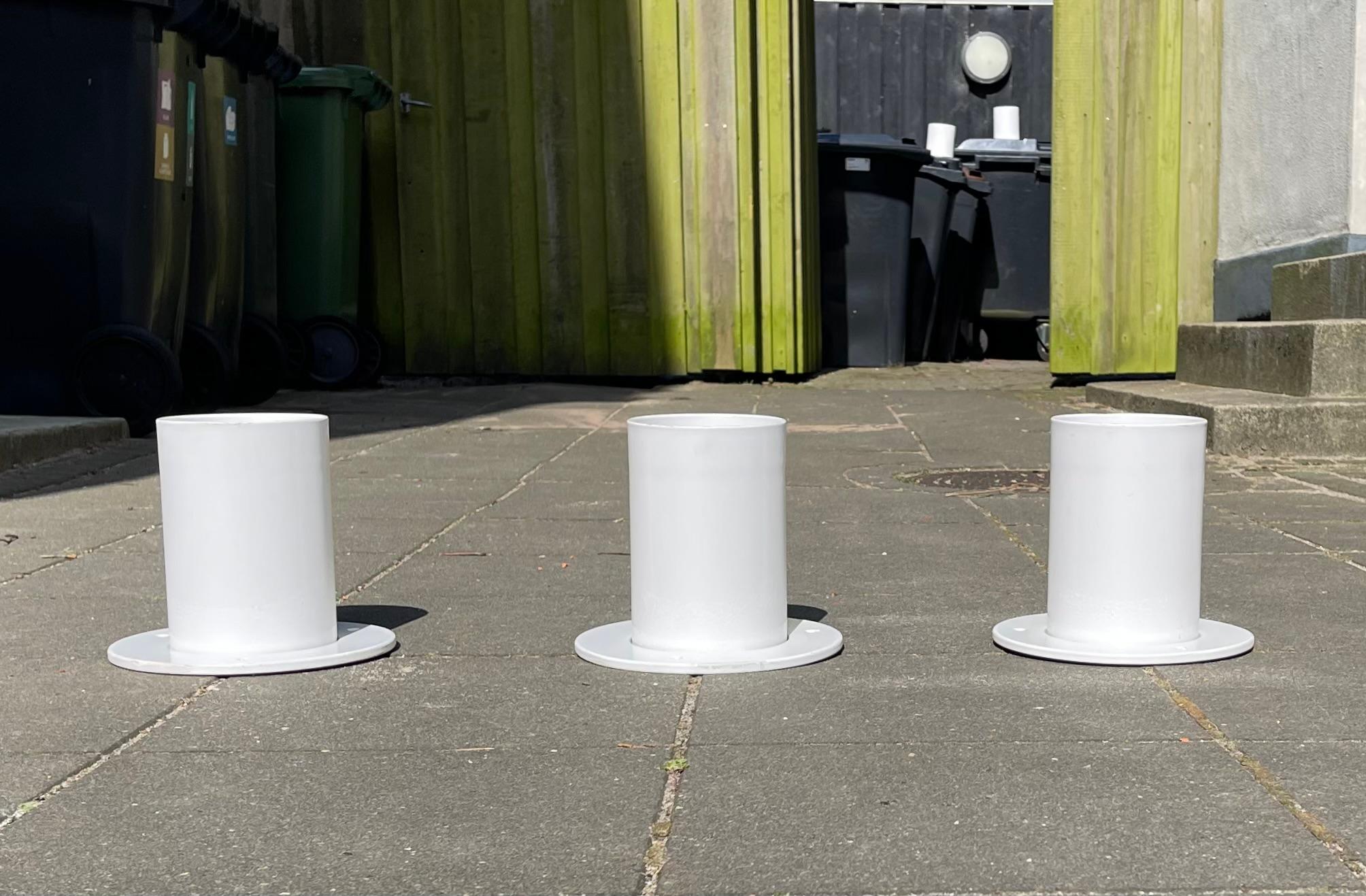A trio of white built-on ceiling or flush mounts in powder coated metal. This design inspired by Gino Sarfatti was created by the Danish architect duo Friis & Moltke in the 1970s. The set of 3 comes all original with internal diffusers and porcelain