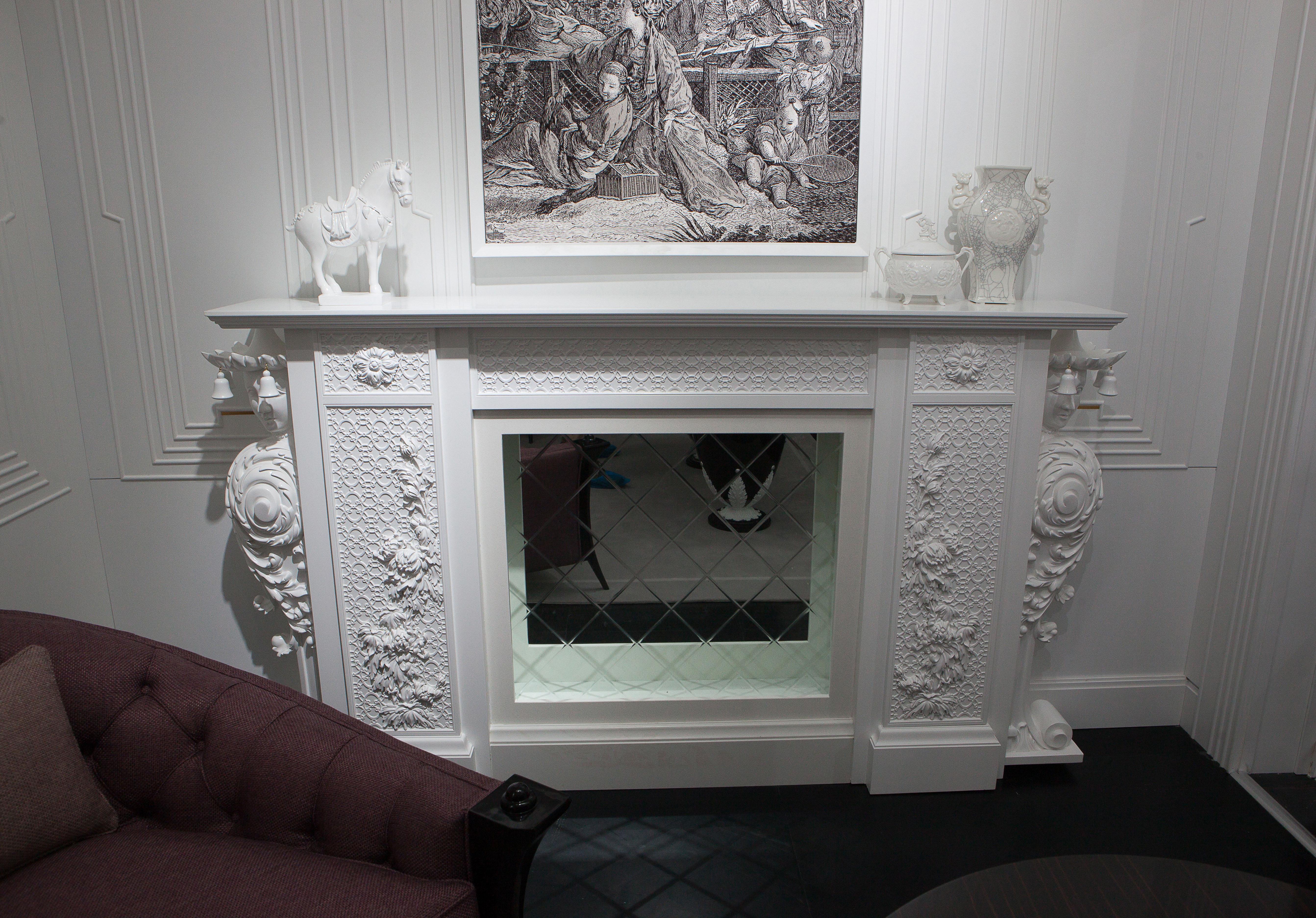 White Decorative Fireplace Сhinoiserie style in Solid Wood and Marble
This decorative white fireplace is a part of a Bespoke collection 