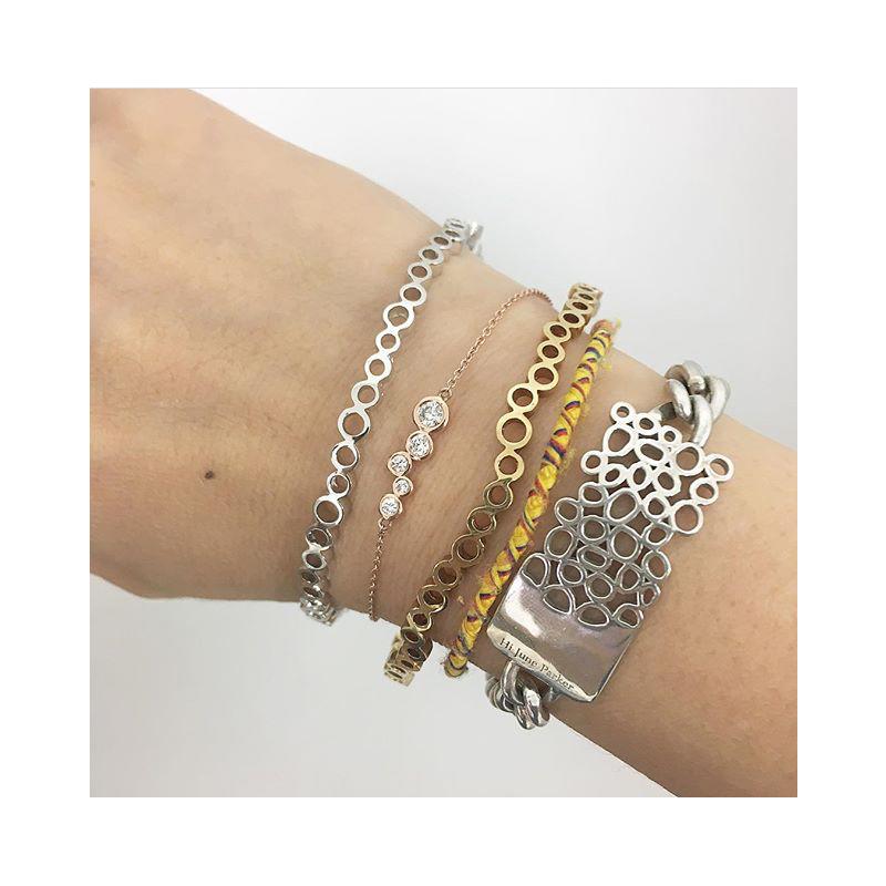 Our sweet mini version of the classic bar bracelet sprinkled with tapering sizes of diamonds.
Great for wearing on it's own or layering with your favorite bracelets! 

White Diamond Stones 0.27 cwt

Inspired by seeing the cross-section view of life,