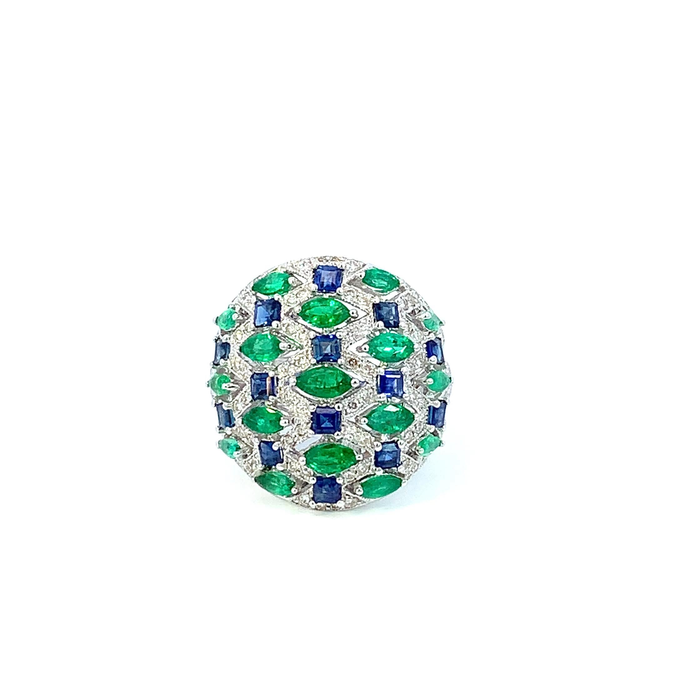 Elevate your style with this exquisite 18K White Gold Ring, meticulously crafted to showcase the mesmerizing beauty of diamonds, emeralds, and sapphires. With a total carat weight of 1.4 carats in diamonds, 2.8 carats in emeralds and sapphires