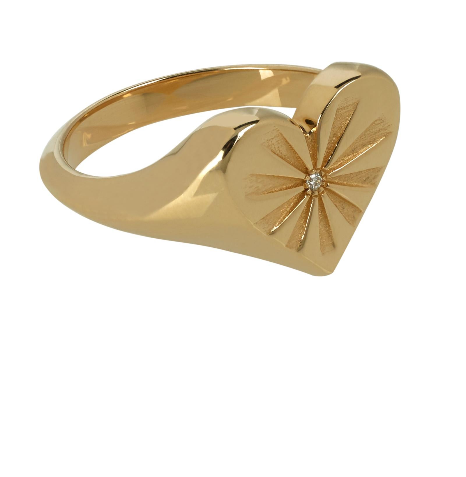 Marlo Laz's twist on a traditional signet, this heart of gold pinky ring is an instant heirloom. This romantic valentine 14 karat love ring features a white diamond and sun-rays of sunshine. Perfect for Valentines Day!

This ring is available in all
