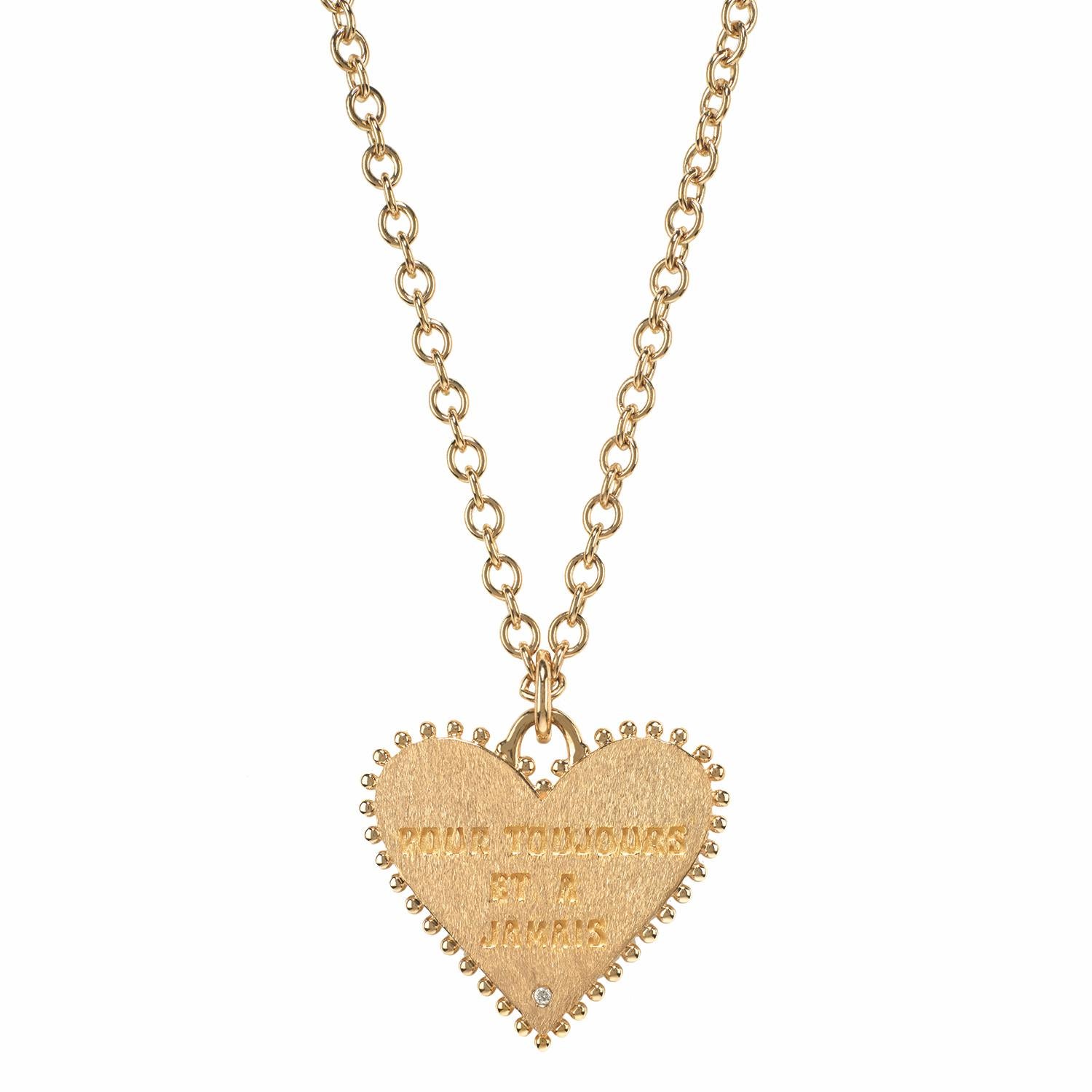 This lovely 14 karat yellow gold two sided Marlo Laz heart charm coin reads on its back 