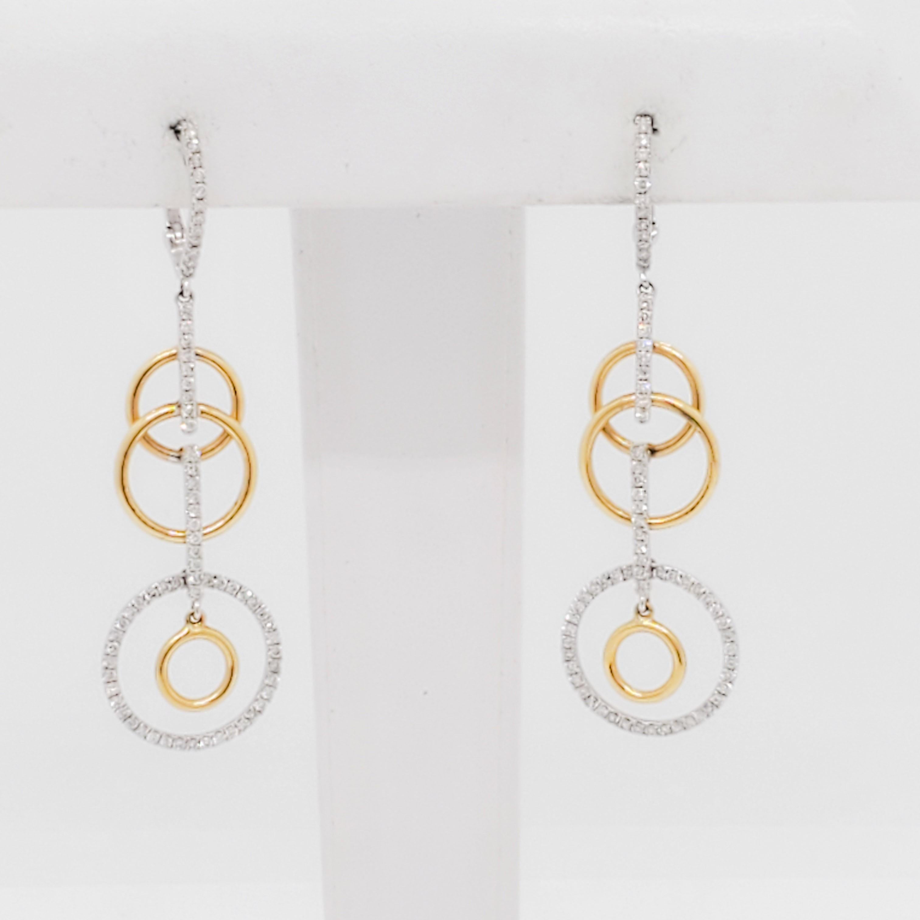 Beautiful earrings with 0.73 ct. good quality white diamond rounds in multiple circles.  Handmade in 14k white and yellow gold.  Perfect for any occasion and easy to wear.
