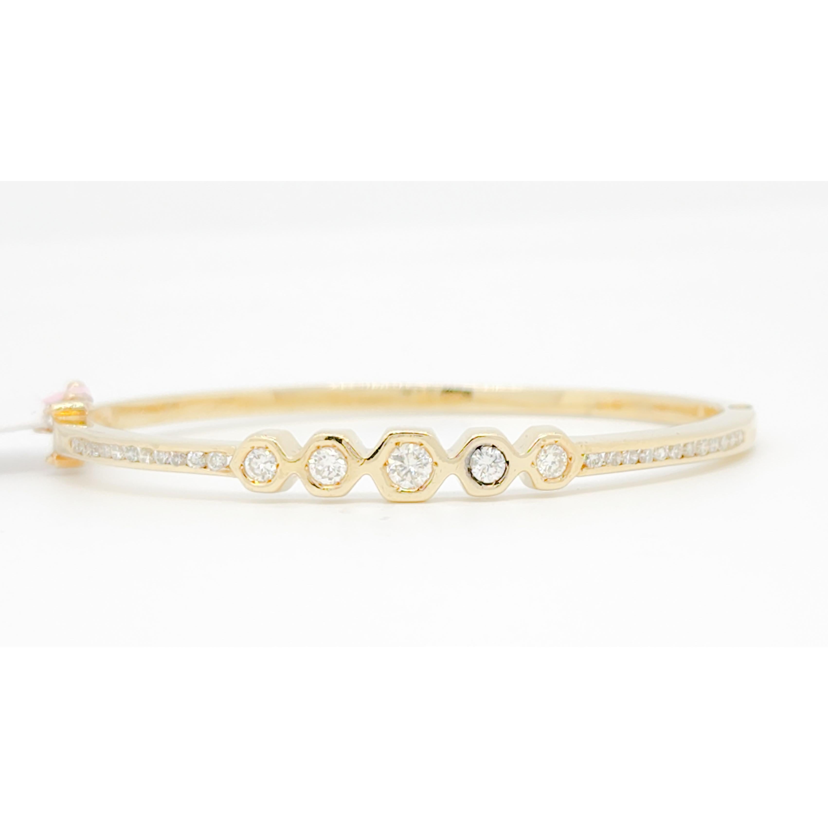 Beautiful bangle with 0.60 ct. good quality white diamond rounds.  Handmade in 14k yellow gold.