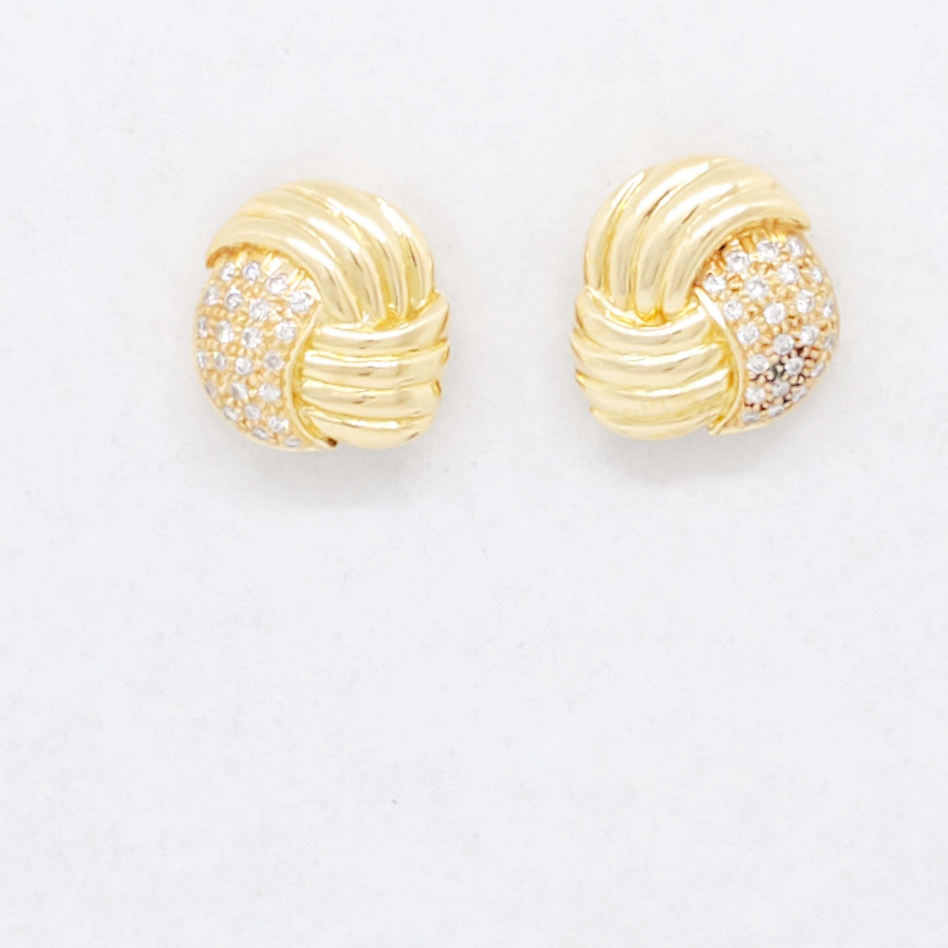 Beautiful earring studs with 0.50 ct. white diamond rounds.  Handmade in 14k yellow gold.