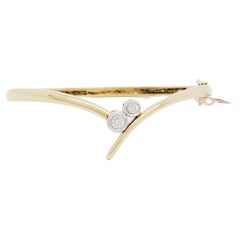 White Diamond and 18k Yellow and White Gold Bangle