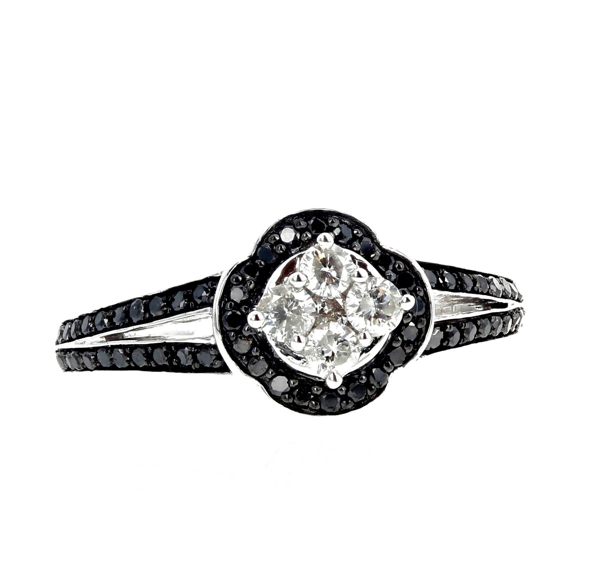 One carat of glittering White Diamonds enhanced with 2 carats of brilliant Black Diamonds set in a lovely Platinum plated sterling silver ring size 6 (sizable).  Also have earrings to match. 
