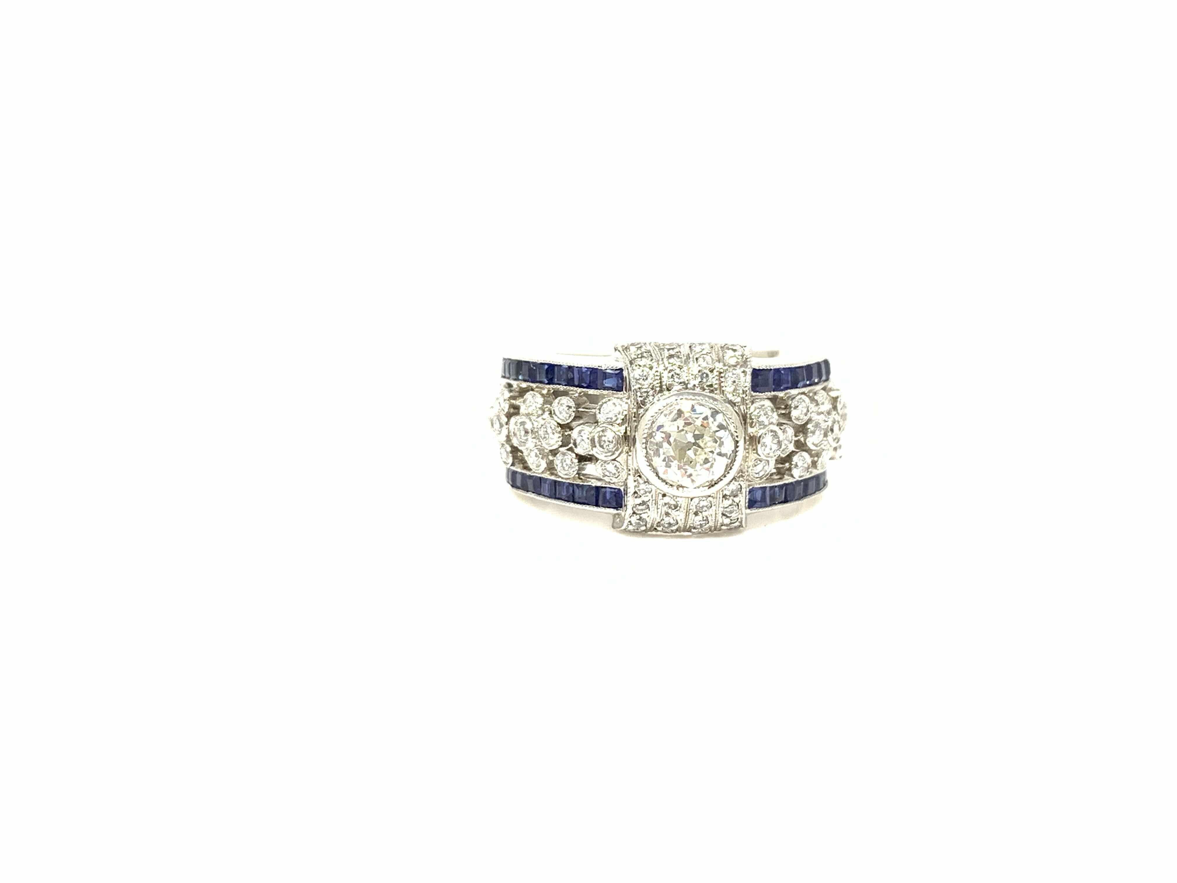 Women's White Diamond and Blue Sapphire Ring in Platinum For Sale