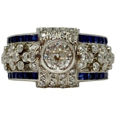 White Diamond and Blue Sapphire Ring in Platinum