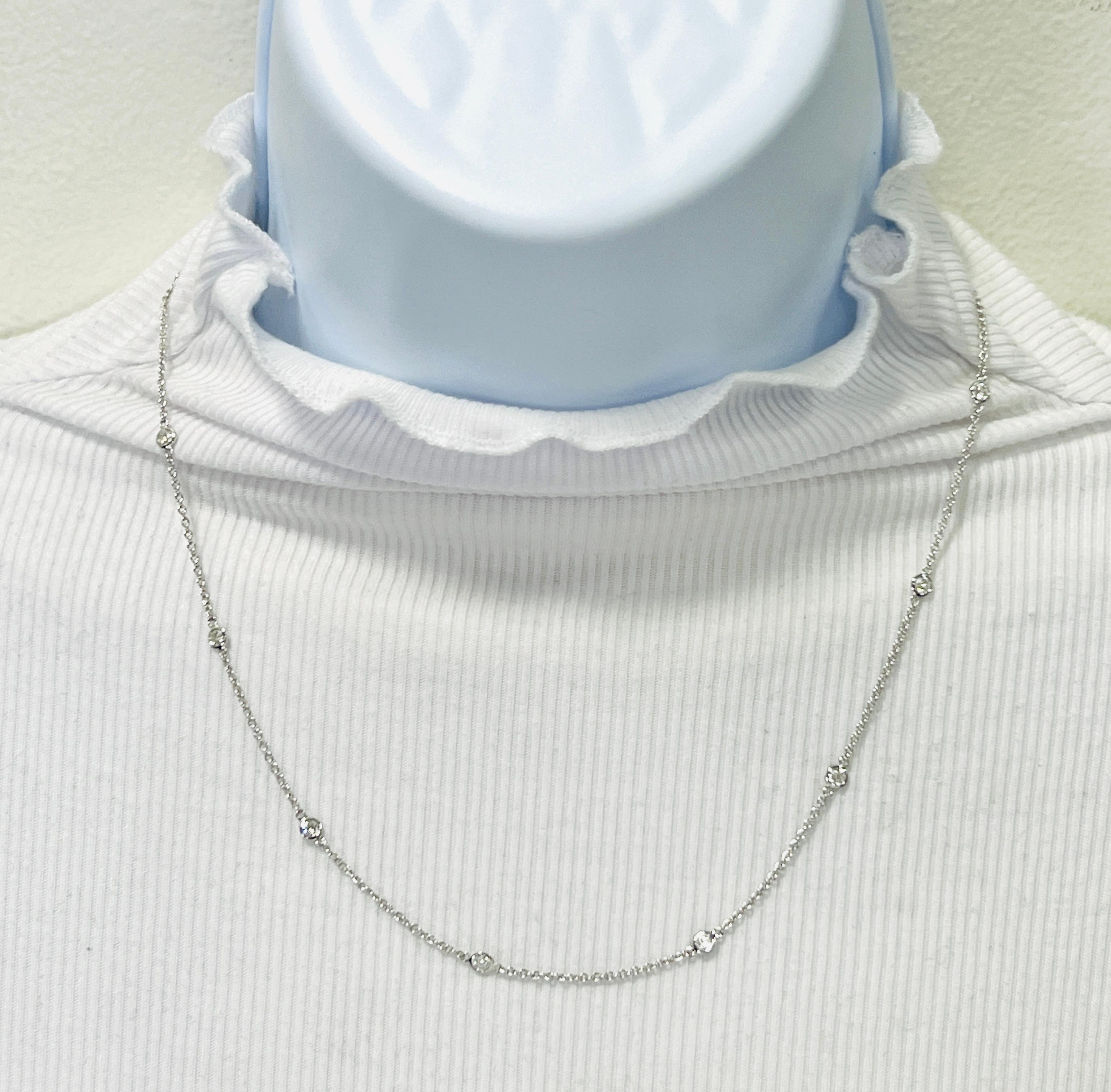 Beautiful necklace with 1.00 ct. good quality, white, and bright diamond rounds.  Handmade in 14k white gold.  Length is 18