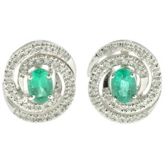 Contemporary 18 Karat White Gold White Diamond and Emerald Earrings 