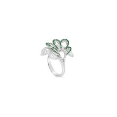 White diamond and emerald modern fashion flower ring in 18kt white gold