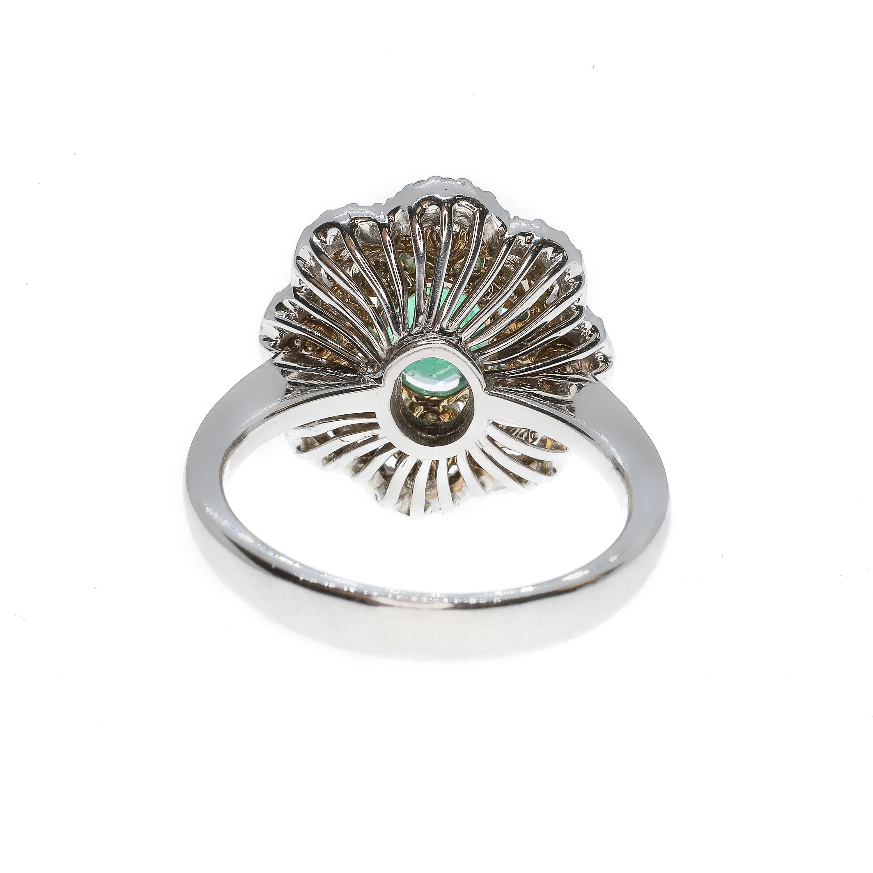 Modern 21st Century 18 Karat White Gold White Diamond and Emerald Flower Cocktail Ring For Sale