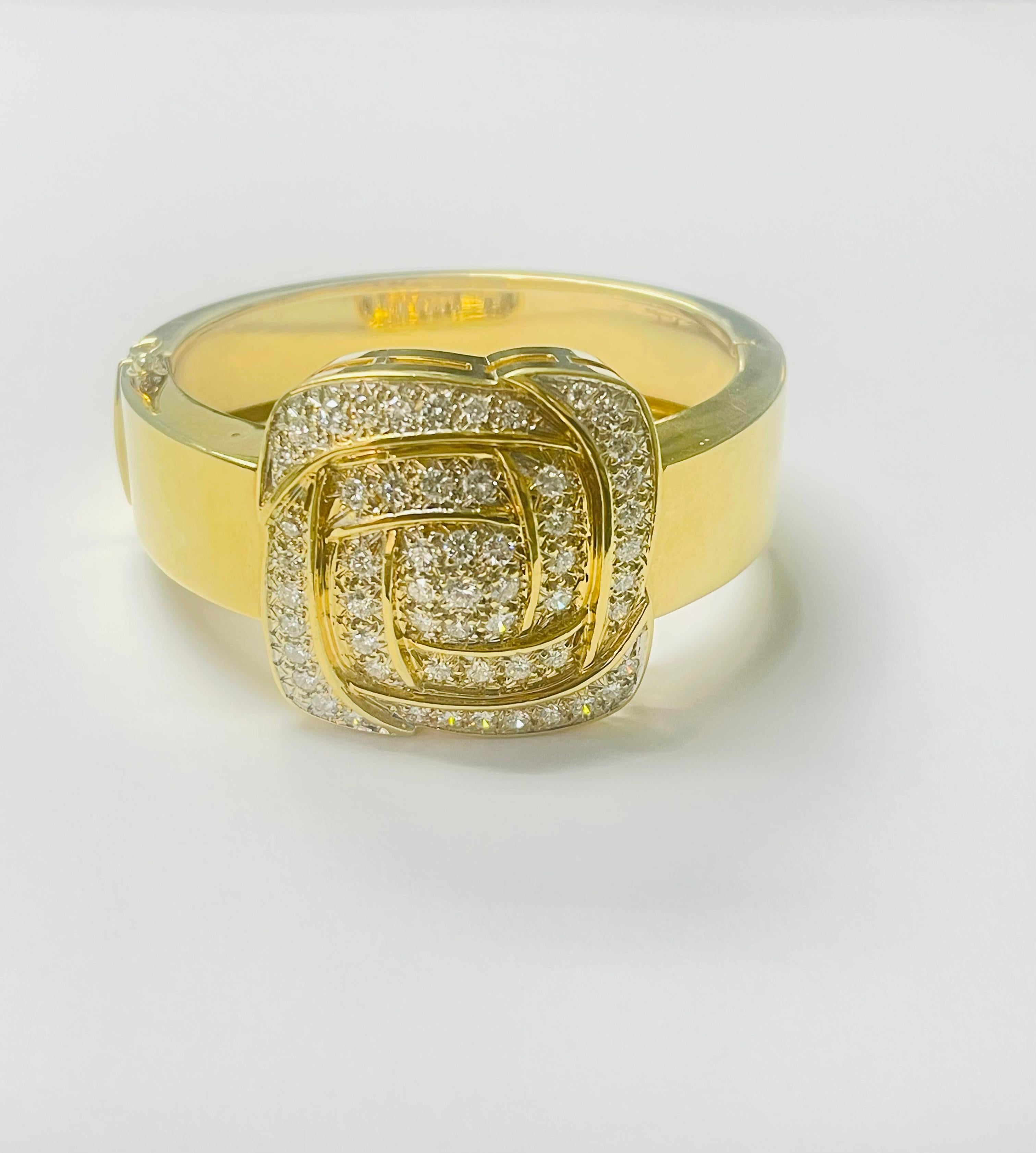 Absolutely stunning White Diamond and Gold bangle beautifully hand made in  18karat yellow gold. 

The details are as follows: 

White diamond weight: 3.50 carats with F color and VS clarity 
Gold weight : 62.3 grams 
Metal : 18 karat gold