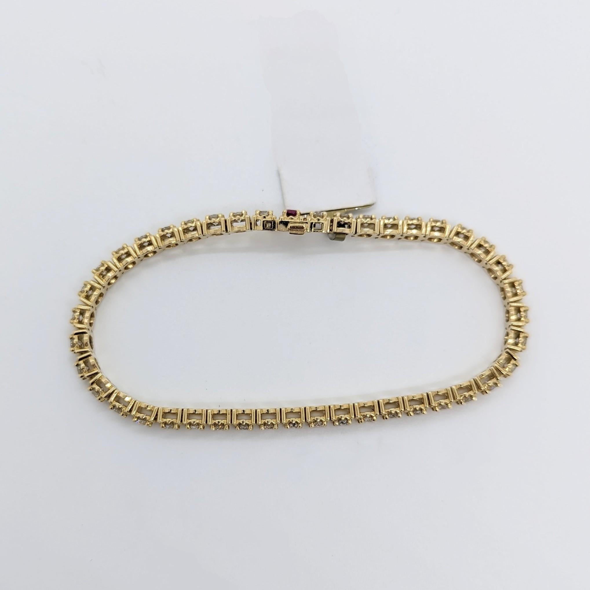 White Diamond and Ruby Tennis Bracelet in 14K Yellow Gold For Sale 1