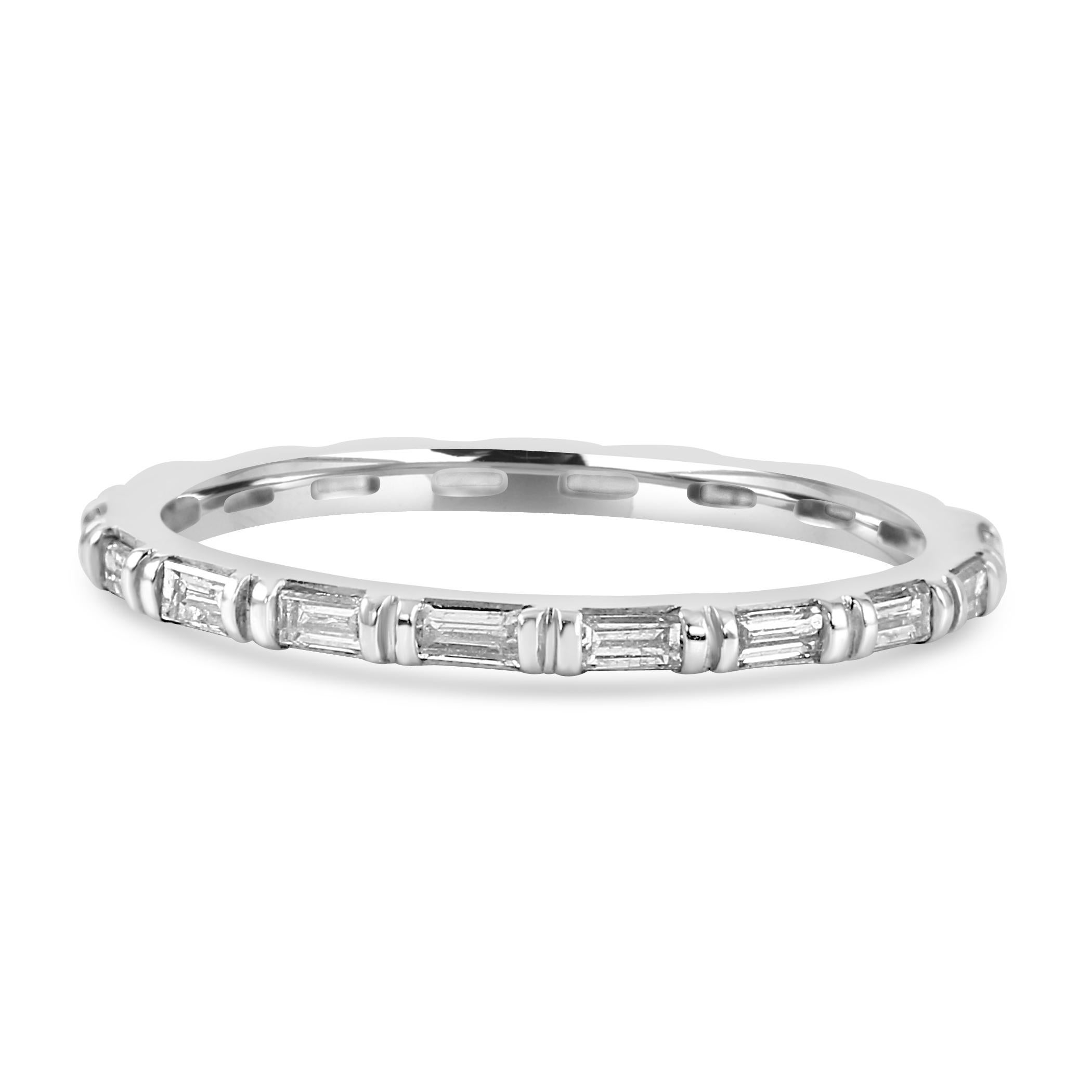 Celebrate your everlasting love with our exquisite diamond baguette eternity engagement band ring!

The ring showcases 0.49 carats of carefully selected white diamonds, each chosen for their exceptional brilliance and clarity. These diamonds are