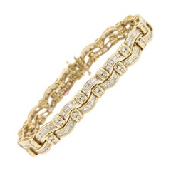 Bracciale con diamanti bianchi baguette e rotondi in oro giallo 14K