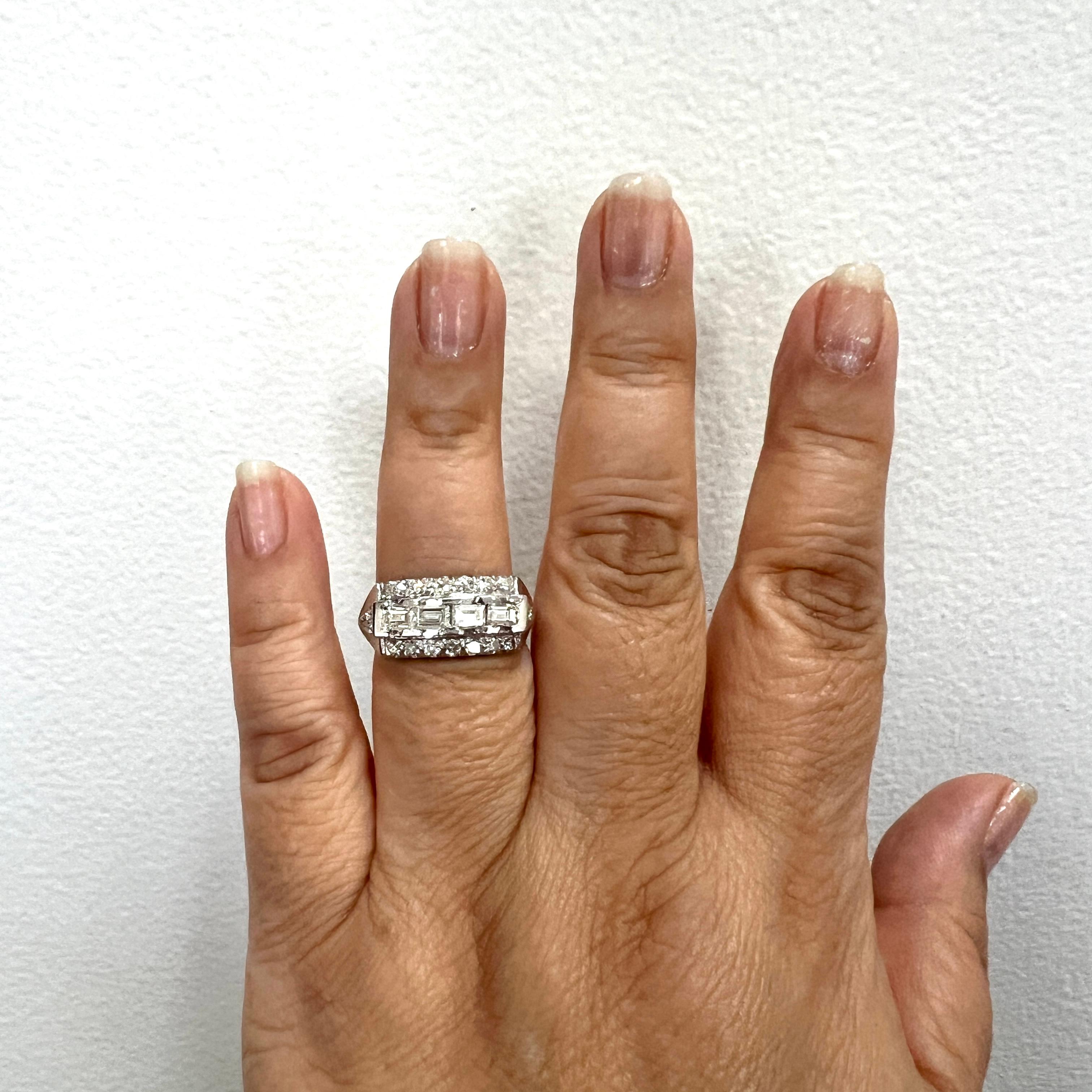 Beautiful white diamond round and baguette ring.  Handmade in platinum.  Ring size 9.