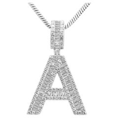 Ciondolo alla moda con diamante bianco Baguette e rotondo in oro bianco 14 kt.