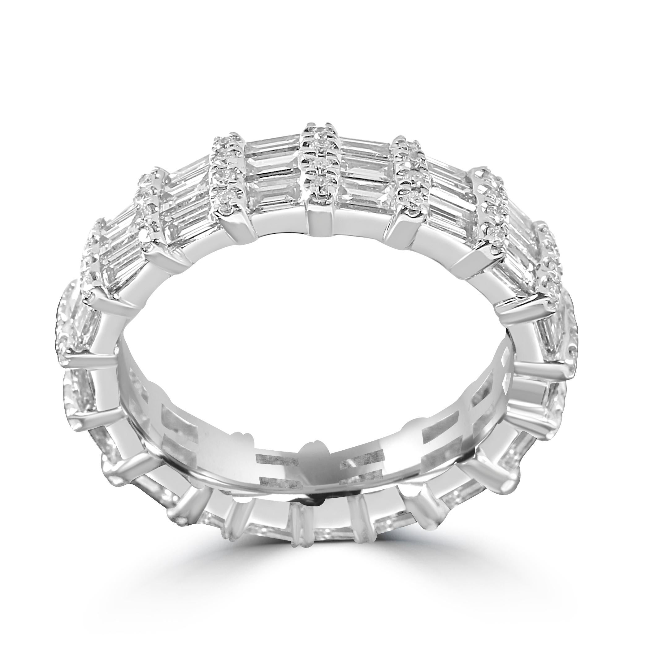 The ring showcases 2.38 carats of meticulously cut white diamond baguettes, each chosen for their exceptional clarity and brilliance. The elongated shape of the baguettes creates a sophisticated and sleek appearance, enhancing the ring's overall