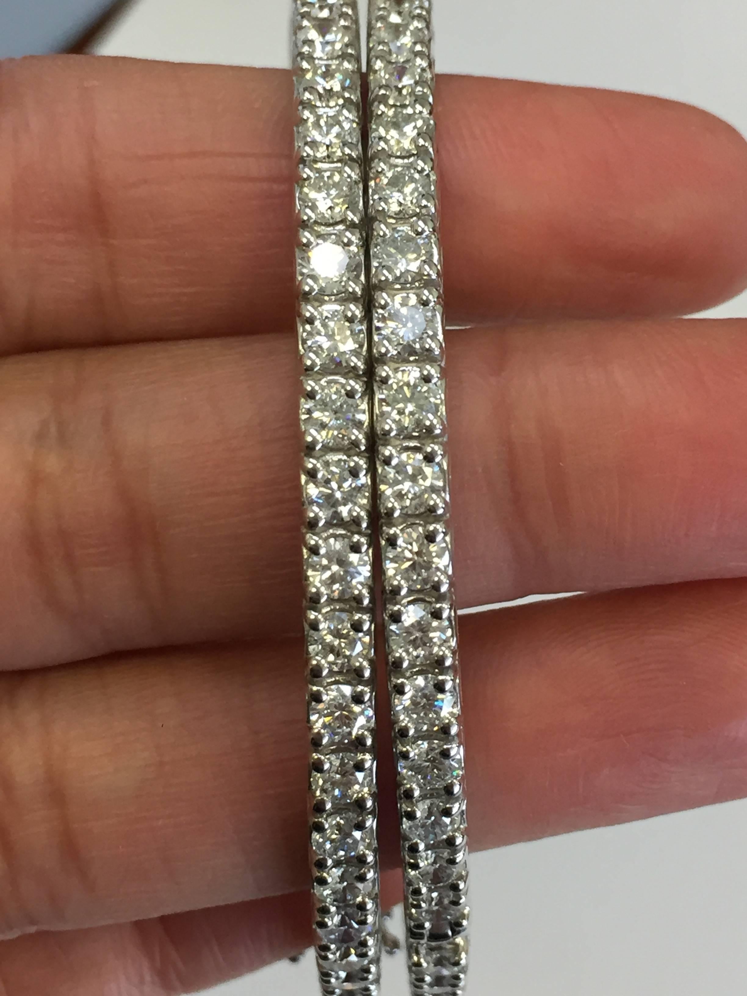 14 carats of brilliant white diamond rounds in these beautifully designed bangle bracelets.  Perfect for stacking or wearing on their own! 