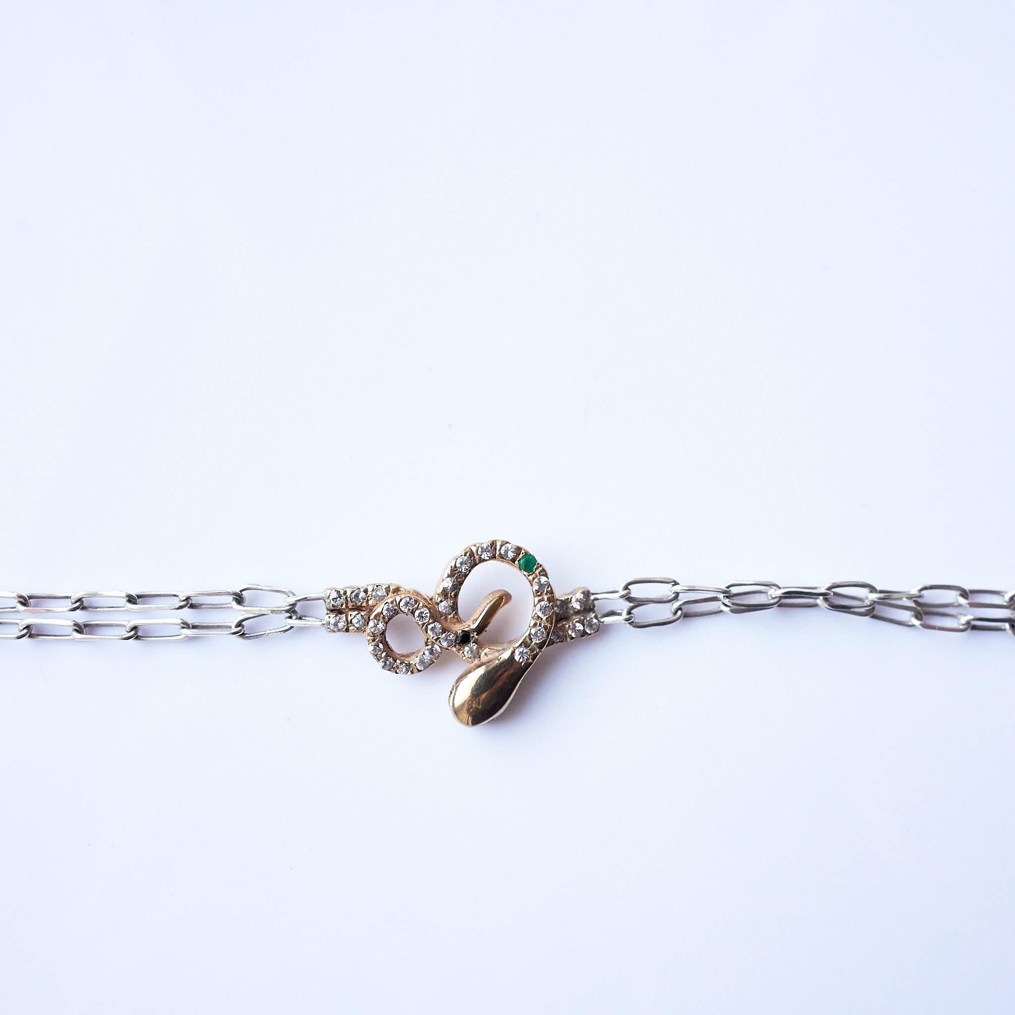 White Diamond Black Diamond Emerald Ruby Snake Bracelet Silver Chain Bronze In New Condition For Sale In Los Angeles, CA
