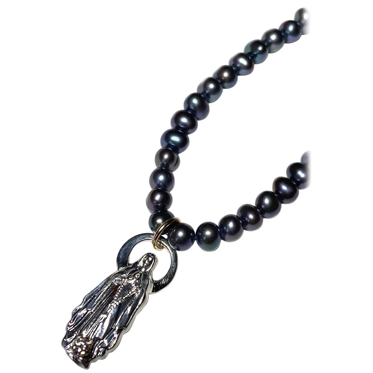 White Diamond Black Pearl Bead Necklace Virgin Mary Medal Pendant J Dauphin

Exclusive piece with Virgin Mary pendant and an White Diamond set in a gold prong on a Silver Figurine pendant. Bead Necklace is 18' long but can be made shorter or longer