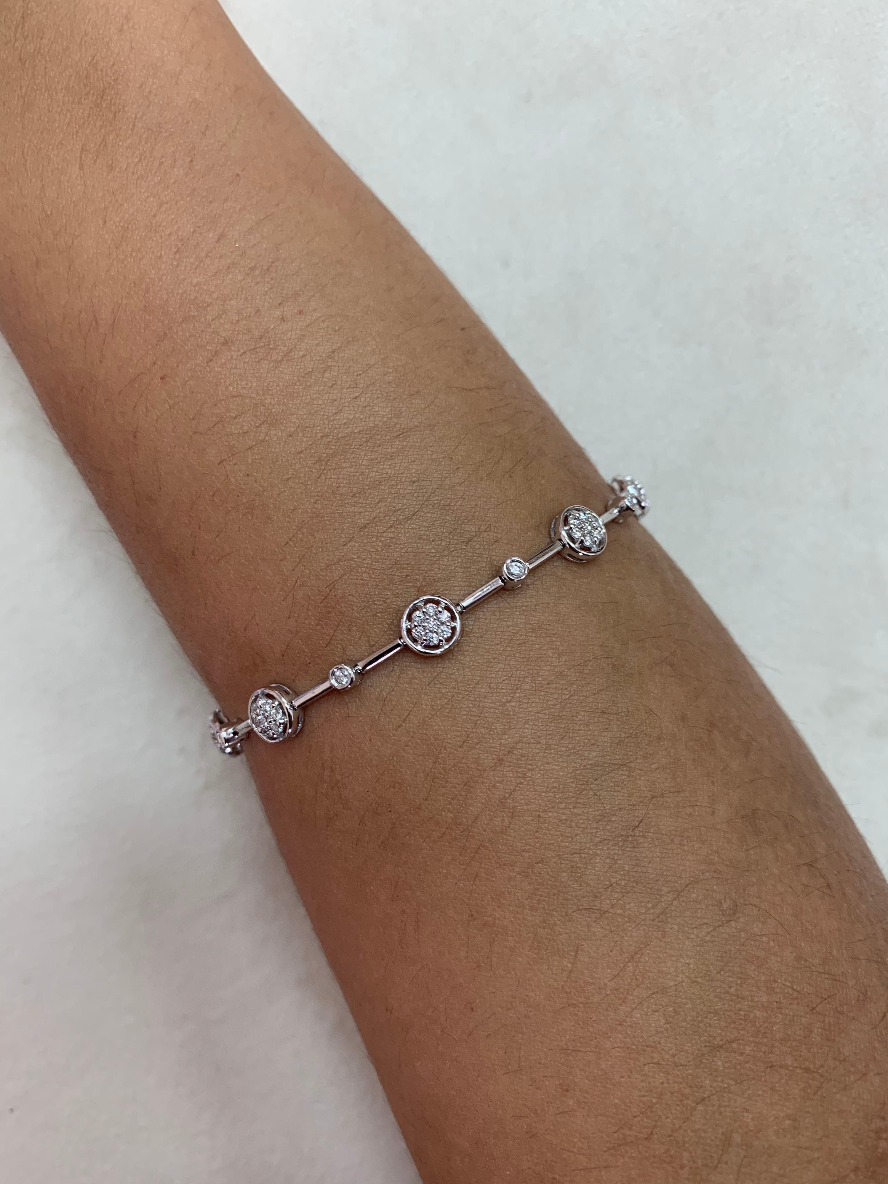 Featuring a collection of everyday designer bracelets by Sunita Nahata. These bracelets are 
light, fun and comfortable, and with subtle details they are given a trendy twist to make them perfect for your everyday wear. 

White Diamond Bracelet in