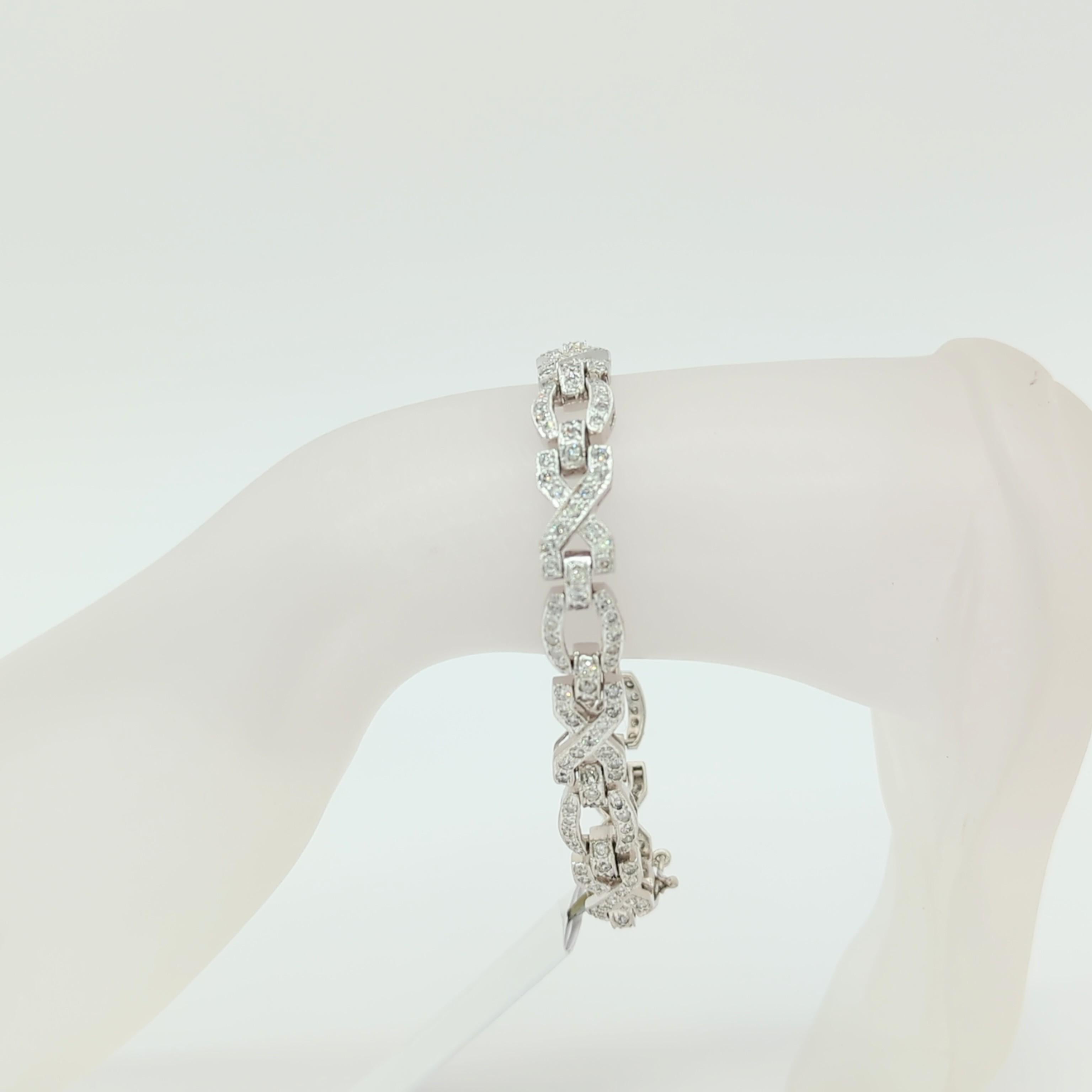 Beautiful bracelet with good quality, white, and bright diamond rounds.  Handmade in 14k white gold.  Length is 7.25