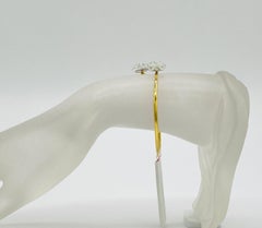 Bracelet ouvert en or jaune 18 carats avec briolette de diamants blancs