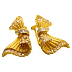 Orecchini a clip con diamante bianco in oro giallo 18 carati