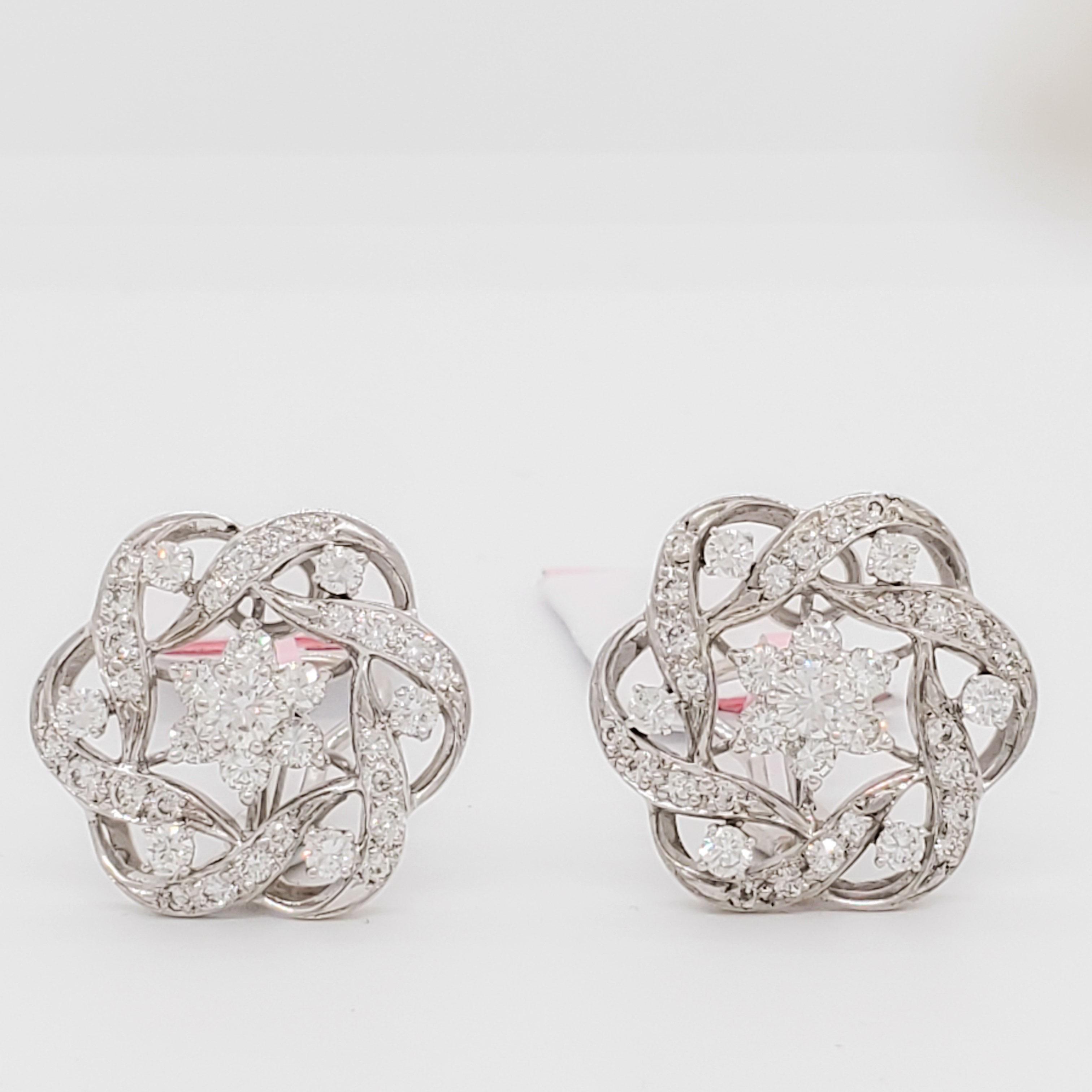 Gorgeous 2.00 ct. good quality white and bright diamond rounds.  Handmade in 14k white gold.  These earrings are versatile and chic.