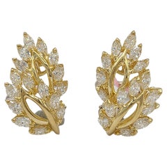 Boucles d'oreilles grappe de diamants blancs en or jaune 18 carats