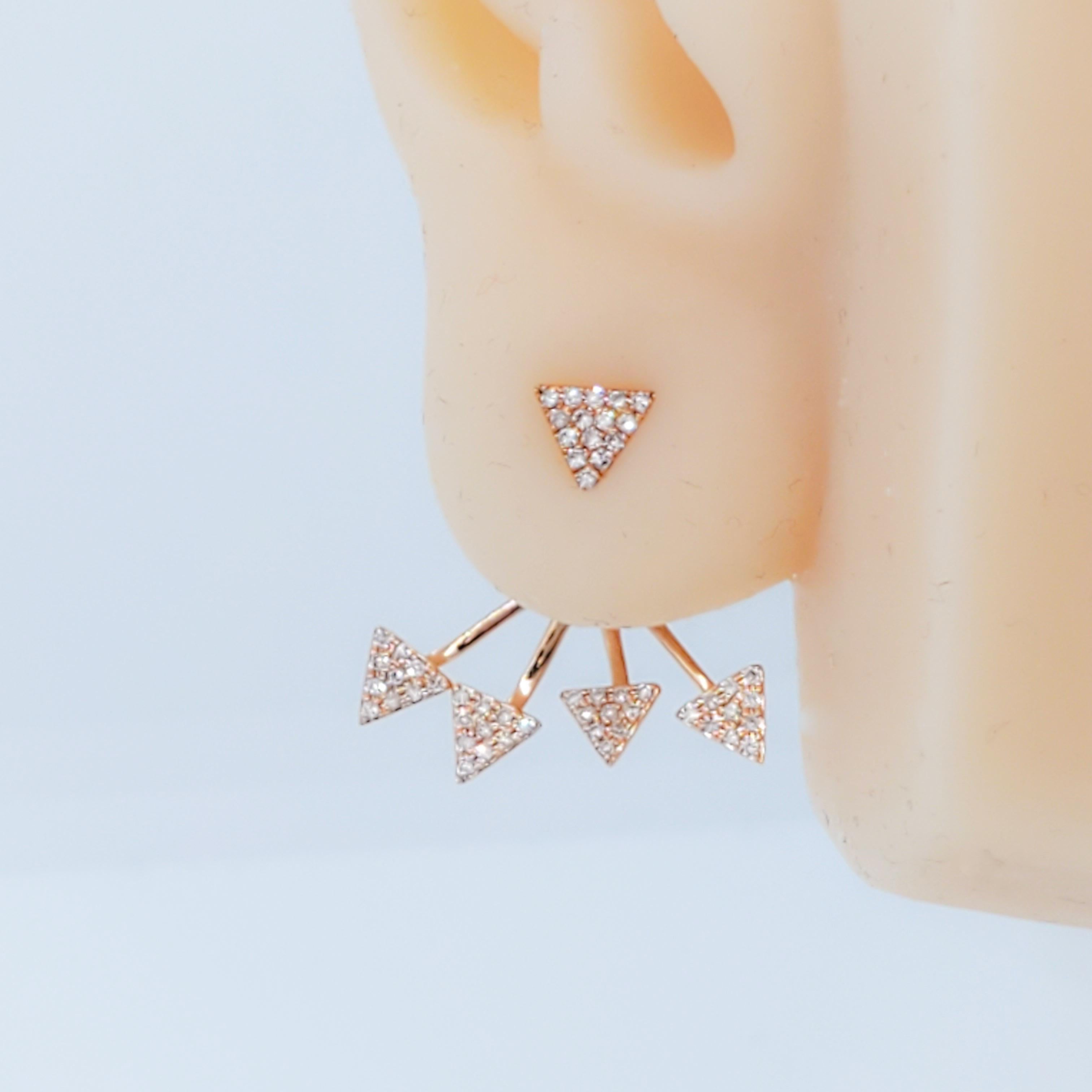 Beautiful contemporary earrings that can be worn as a stud or with the spray diamonds under the lobe.  Total of 0.20 ct. of good quality white diamond rounds.  Handmade 14k rose gold mountings.  Push back.  