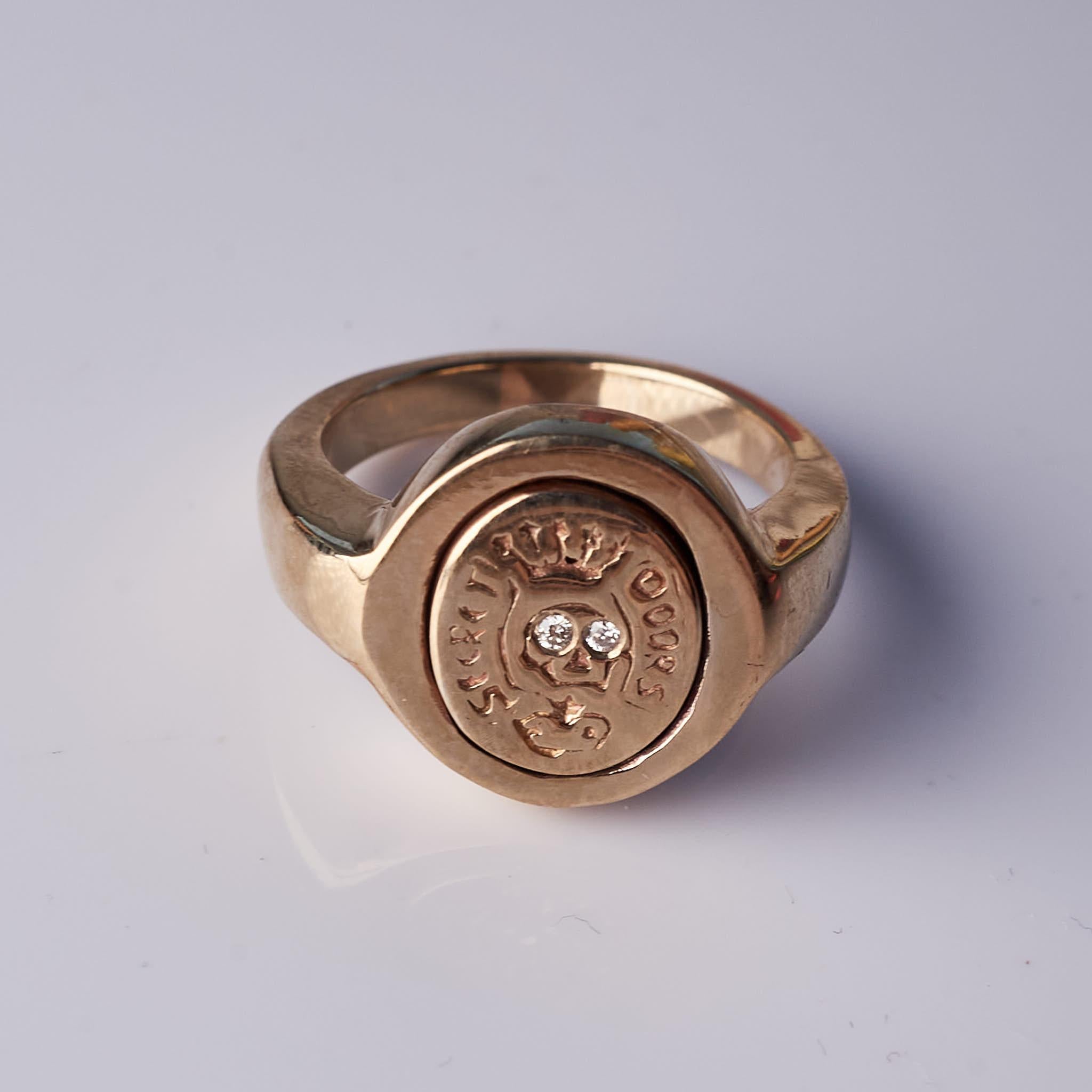 White Diamond Crest Signet Ring Memento Mori Style Skull 
Material: Bronze
Designer: J DAUPHIN 
Size: 6 1/2
Signature piece 