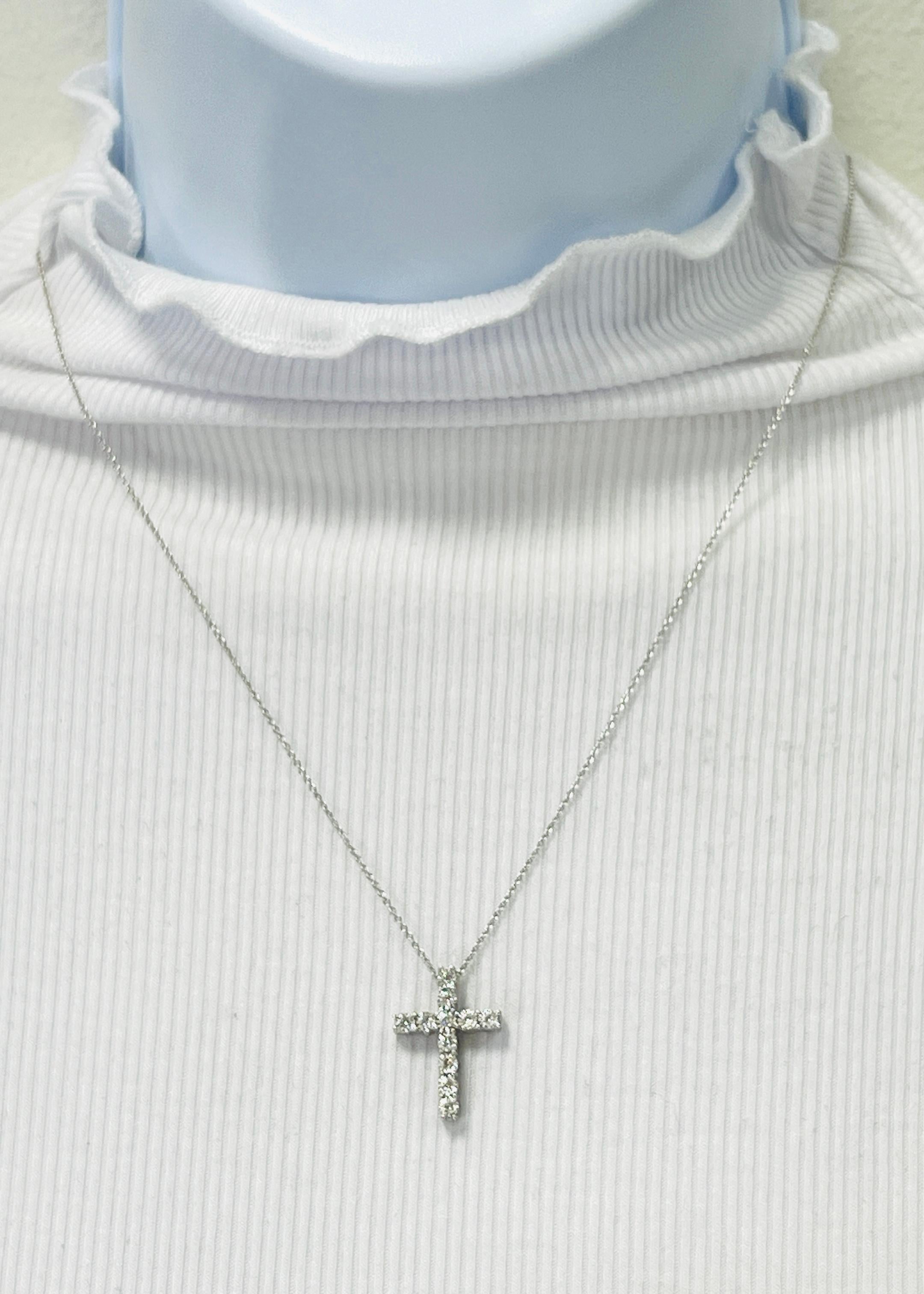 Beautiful pendant necklace with 0.25 ct. good quality white diamond rounds.  Handmade in 14k white gold.  Length of chain is 18